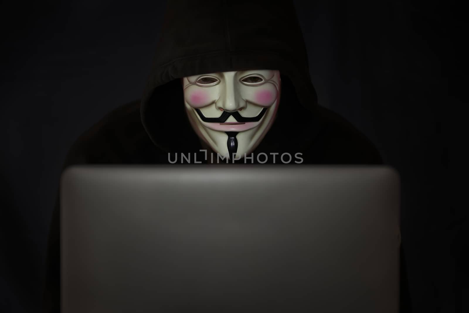 picture of a hacker on a computer by vinciber
