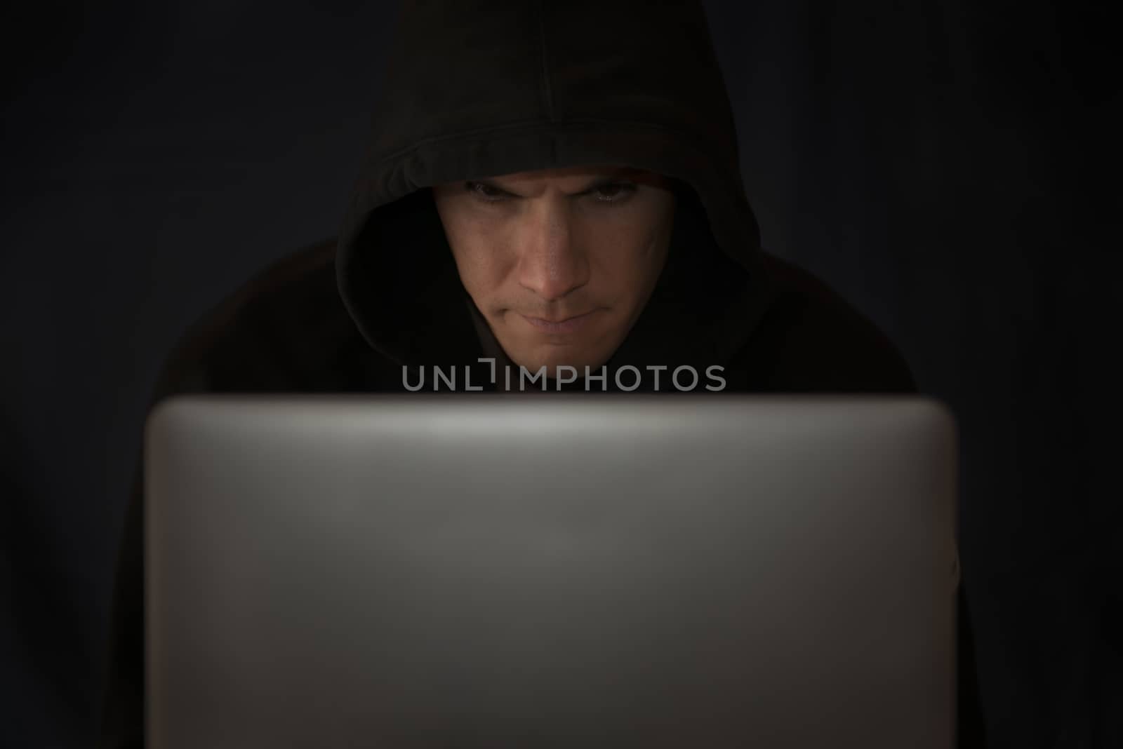 picture of a hacker on a computer by vinciber