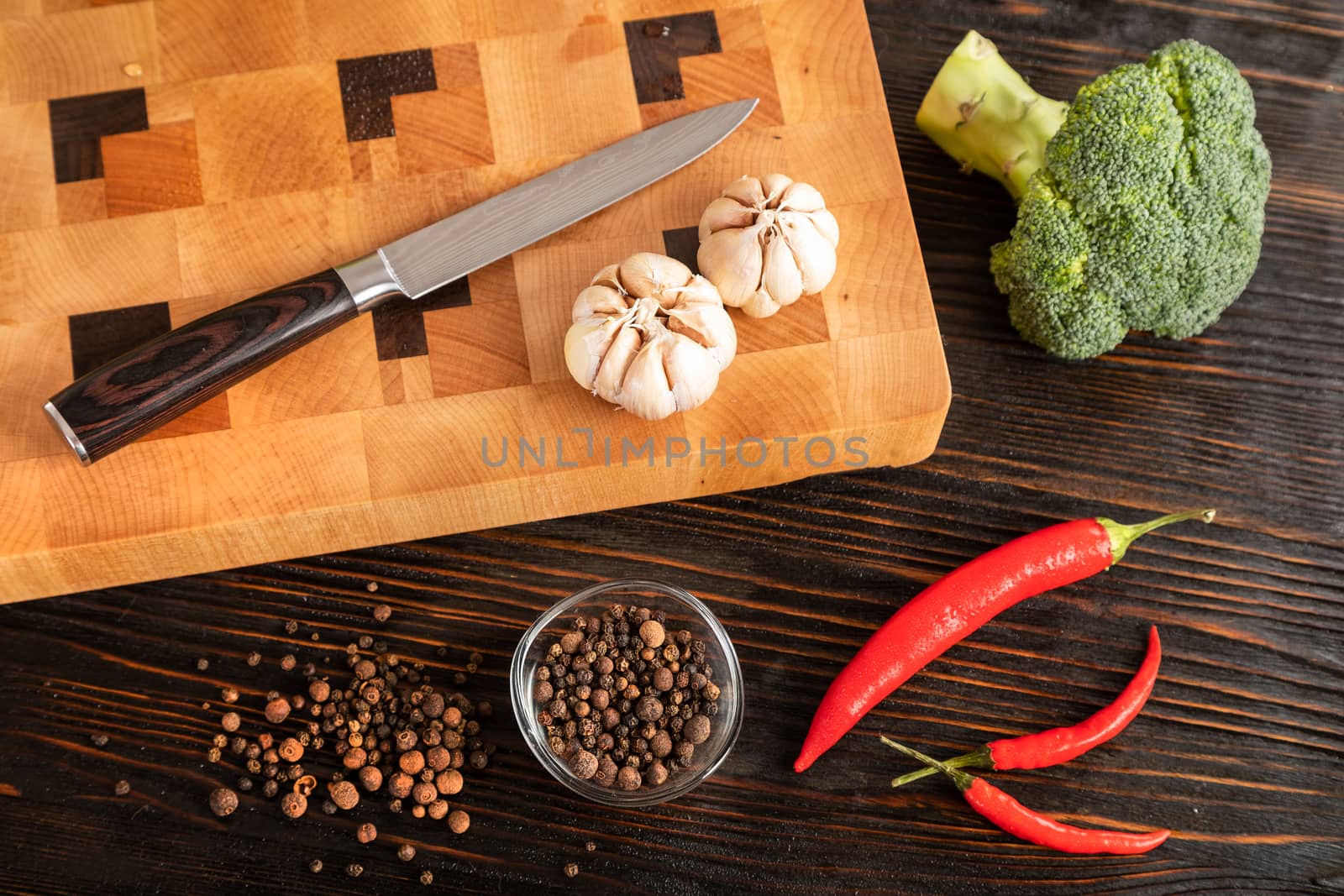Vegetables and spices on a cutting board by sveter