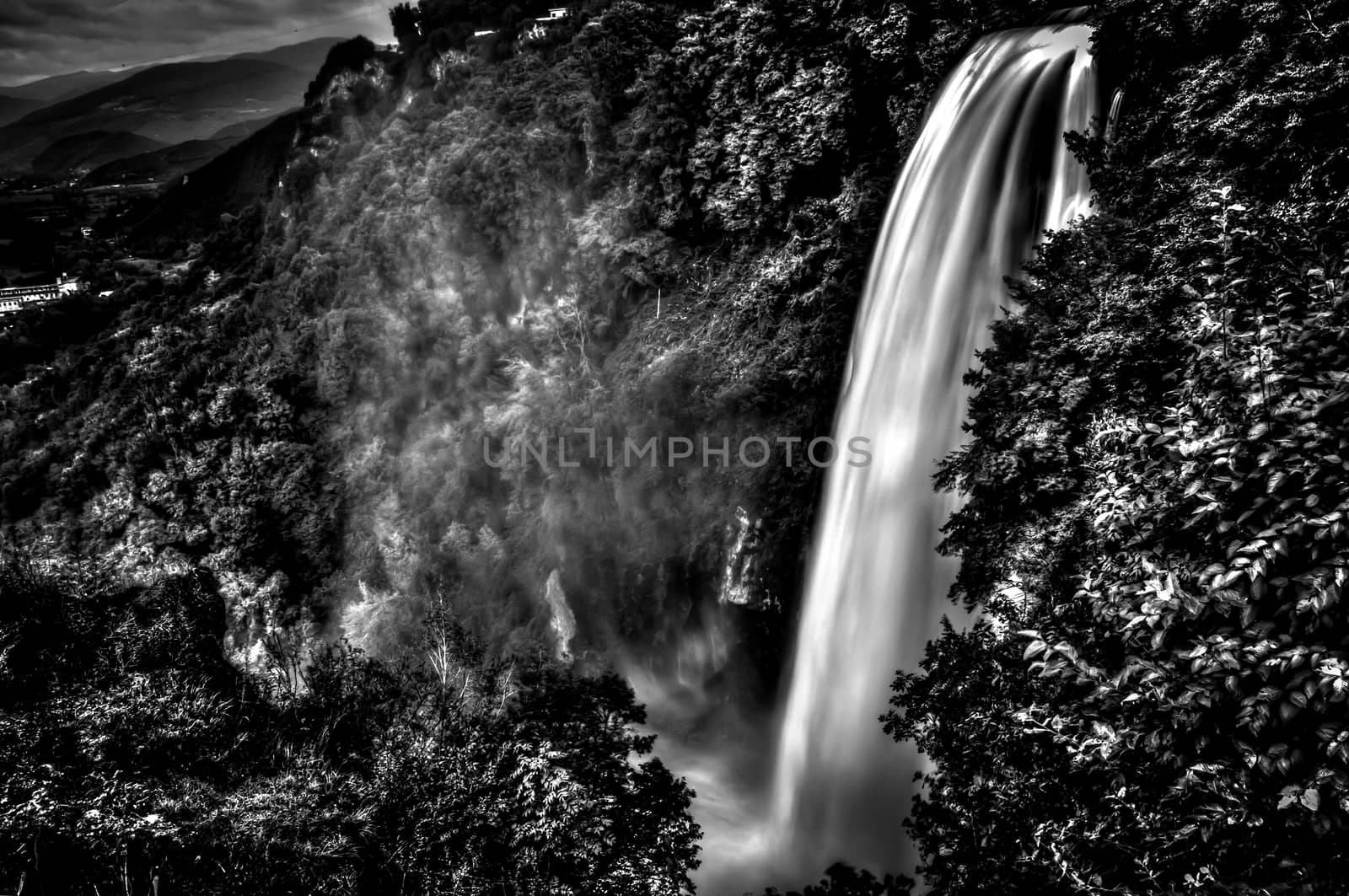 waterfall in deep forest of Valle D'Aosta, Italy.