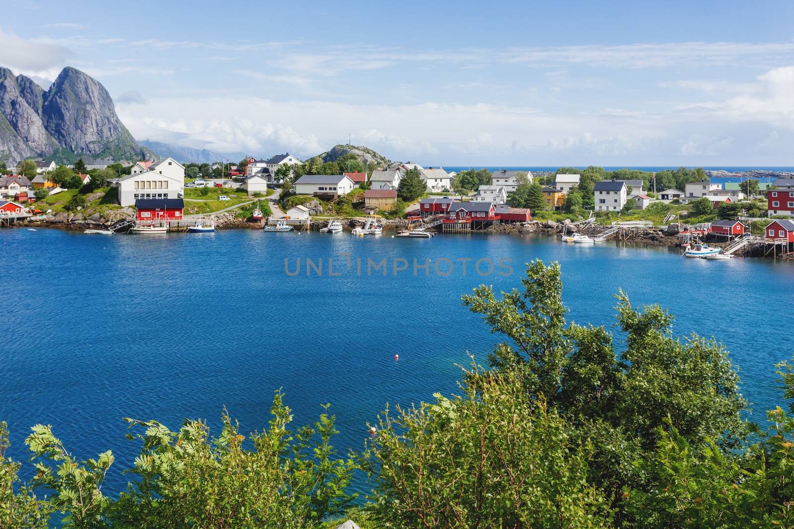 Beautiful scandinavian landscape with mountains and fjords. Panorama view of Reine village on Lofoten islands, Norway.