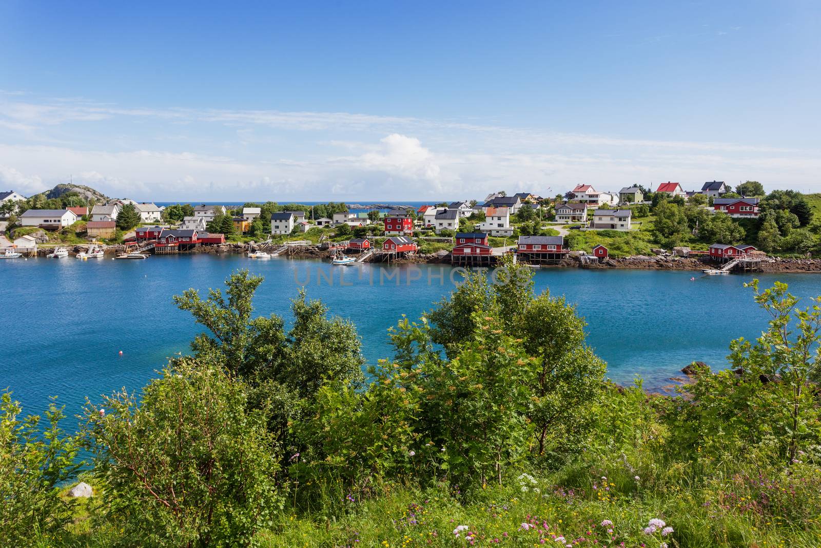 Beautiful scandinavian landscape with mountains and fjords. Panorama view of Reine village on Lofoten islands, Norway.
