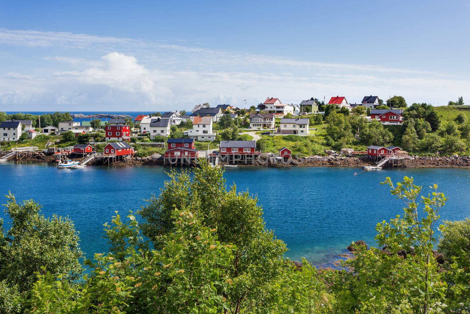 Beautiful scandinavian landscape with mountains and fjords. Panorama view of Reine village on Lofoten islands, Norway.