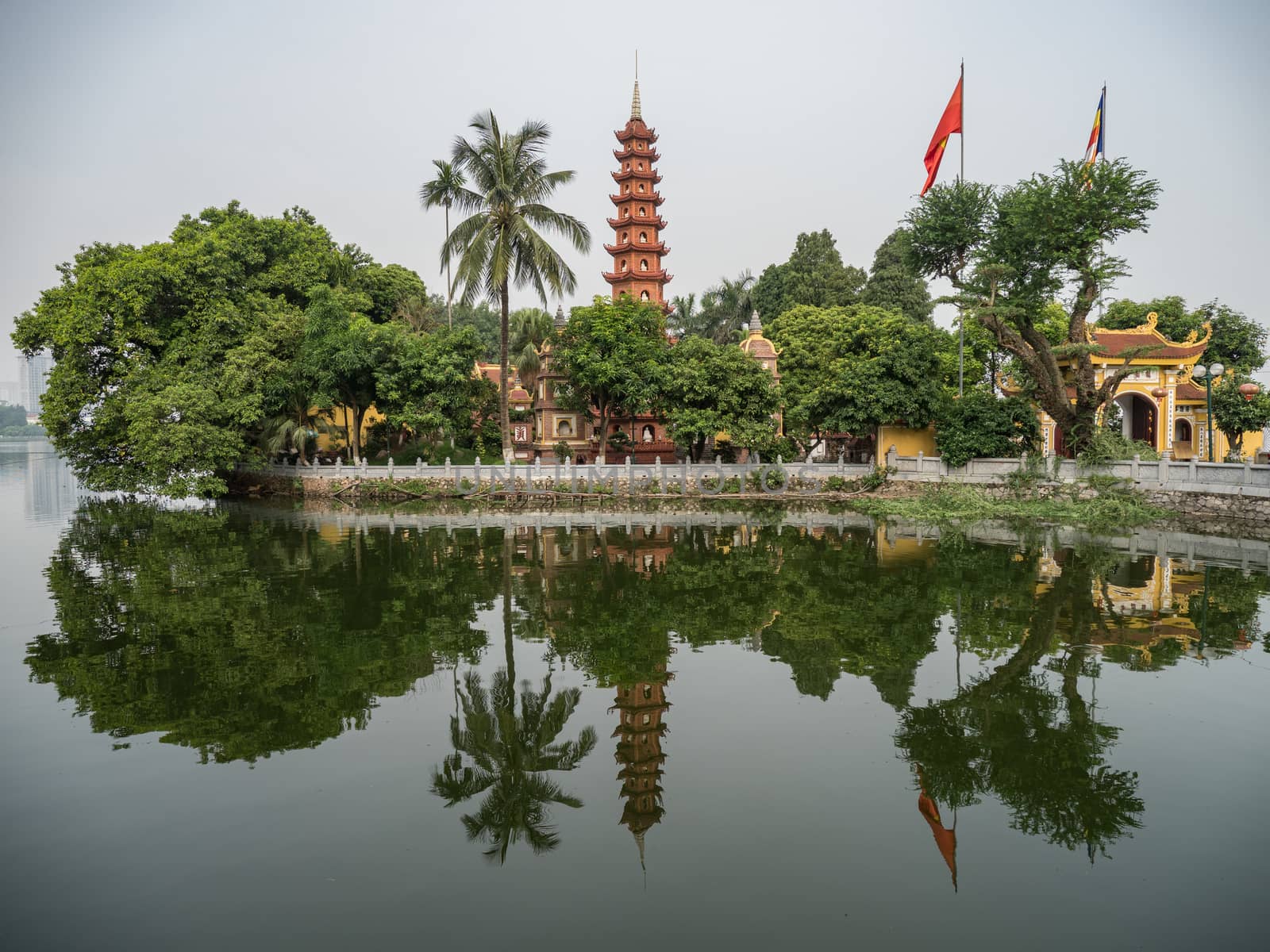 details of vietnan temples with reflections in the lake