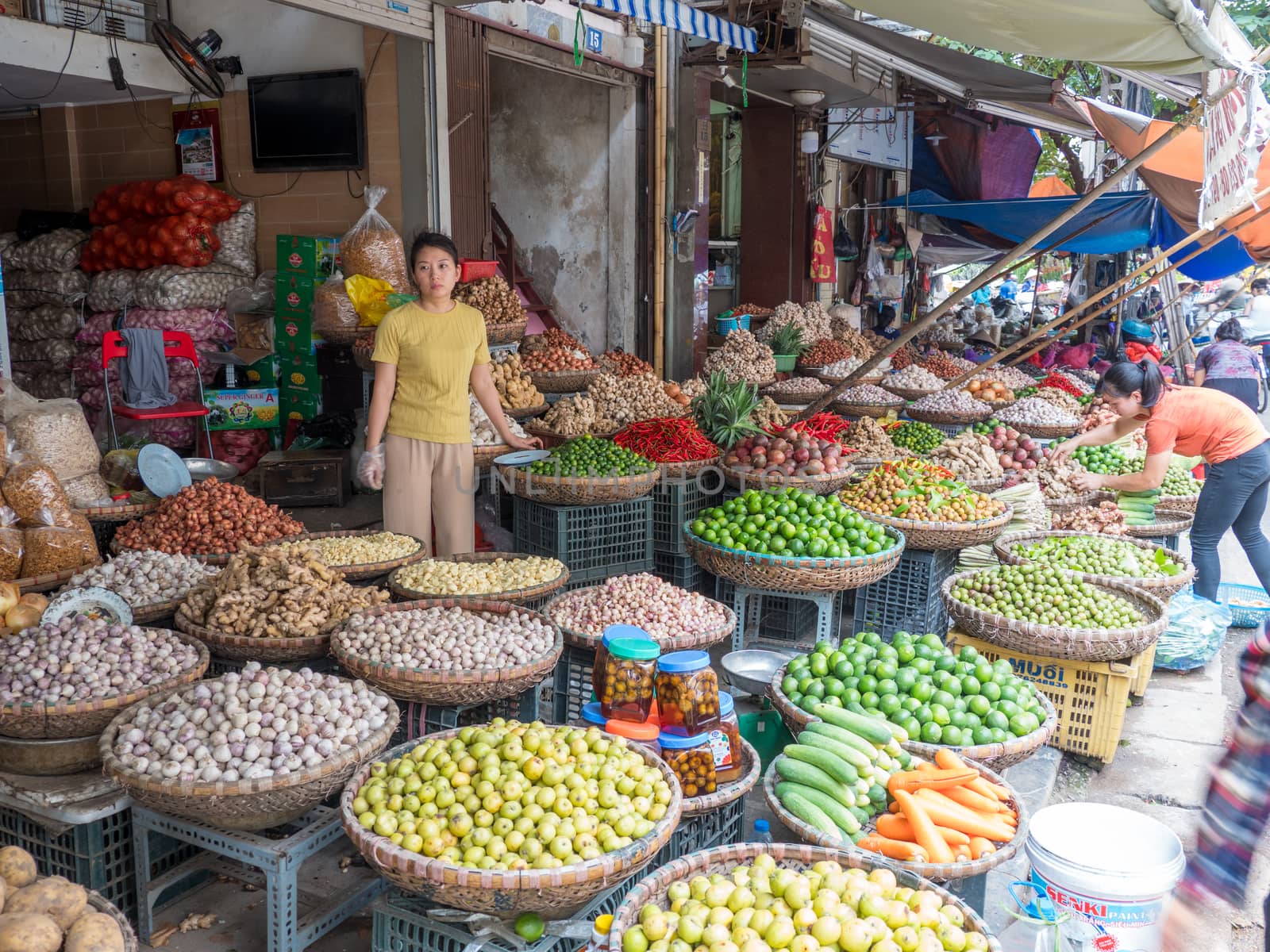 typical vietnam market, many food baskets