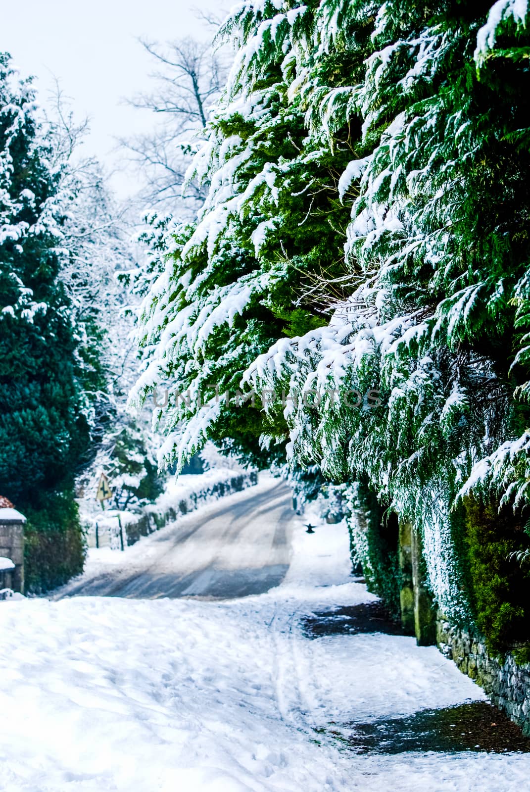 Snowy Road through a Lake District Landscape in Winter by paddythegolfer