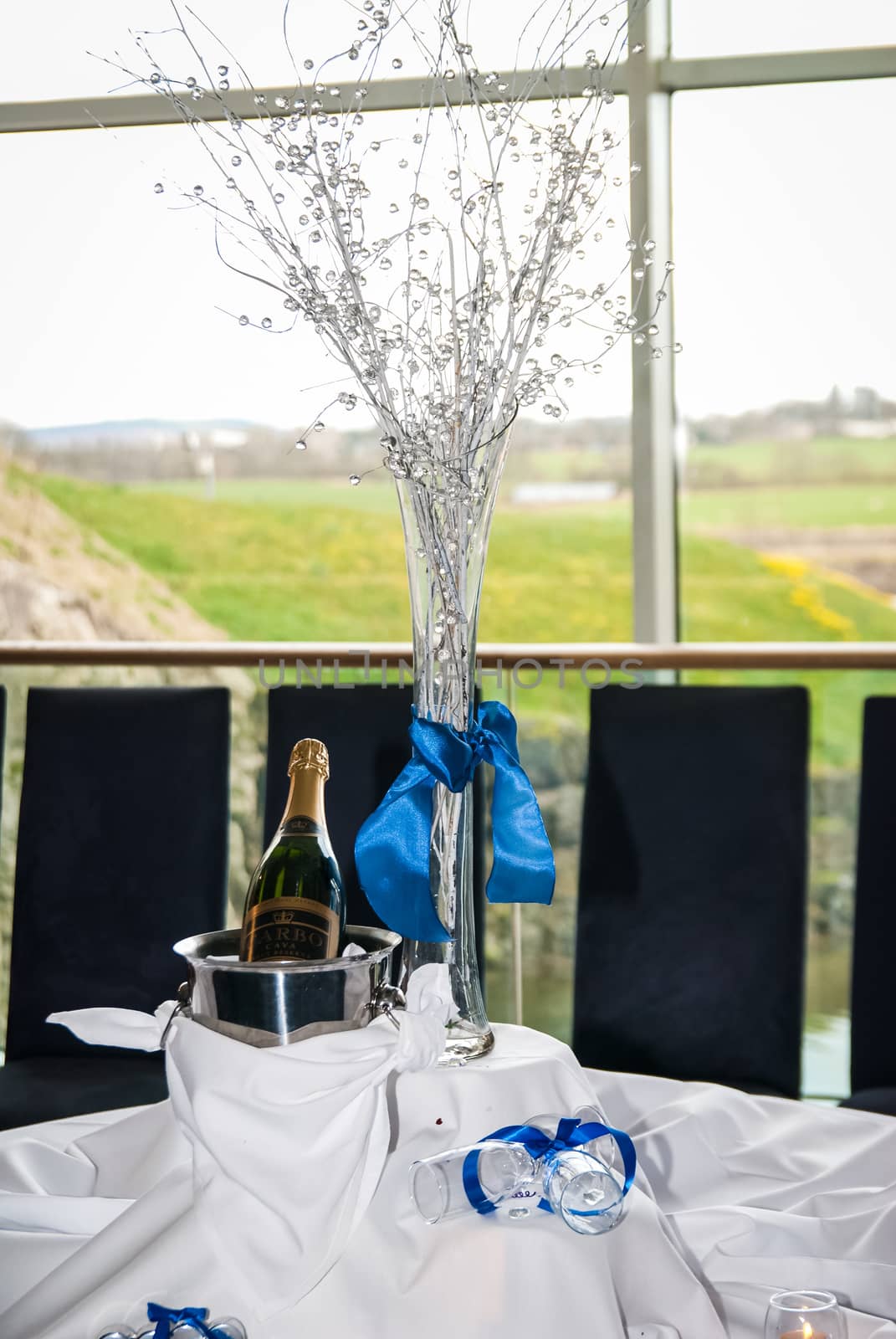 Wedding Champagne Glasses with a bottle of champagne UK