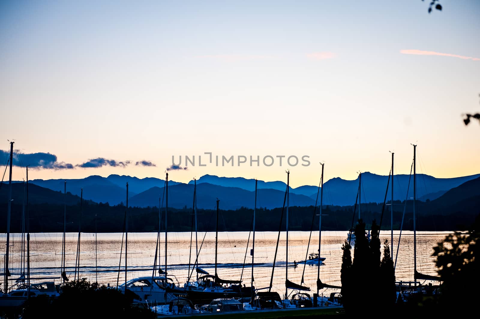 Mast of Boats at Low Wood Bay Windermere Cumbria at sunset