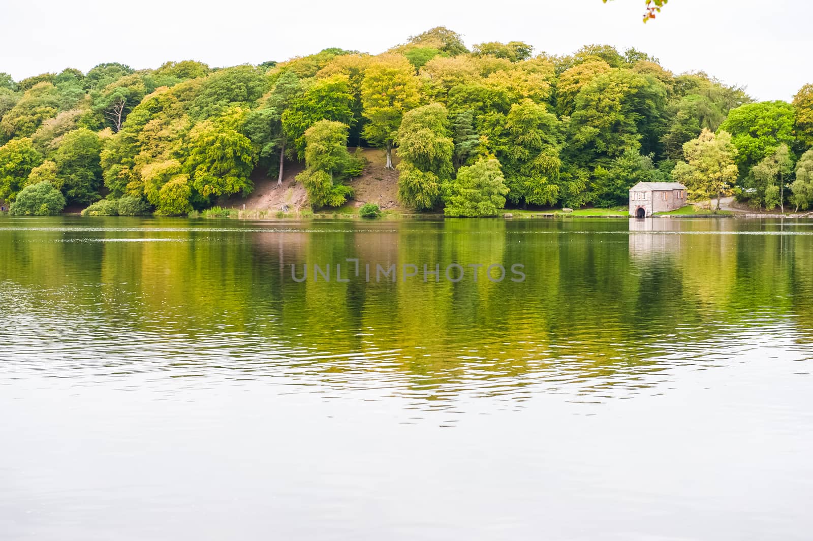 Talkin Tarn. The view across Talkin Tarn, Cumbria England. The tarn is a glacial lake and country park close to the town of Brampton.