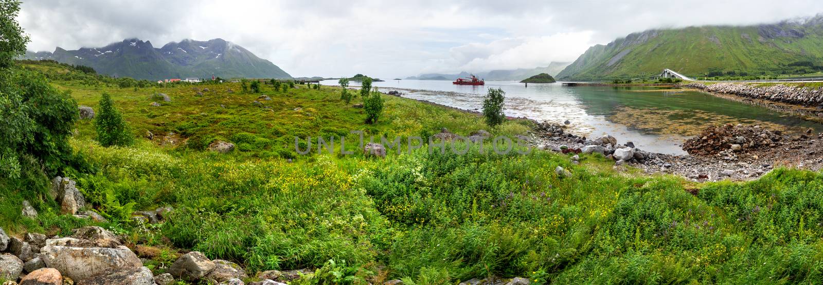 Beautiful scandinavian landscape with Atlantic Ocean Road (Atlanterhavsvegen), meadows, mountains and fjords. Lofoten islands, Norway.