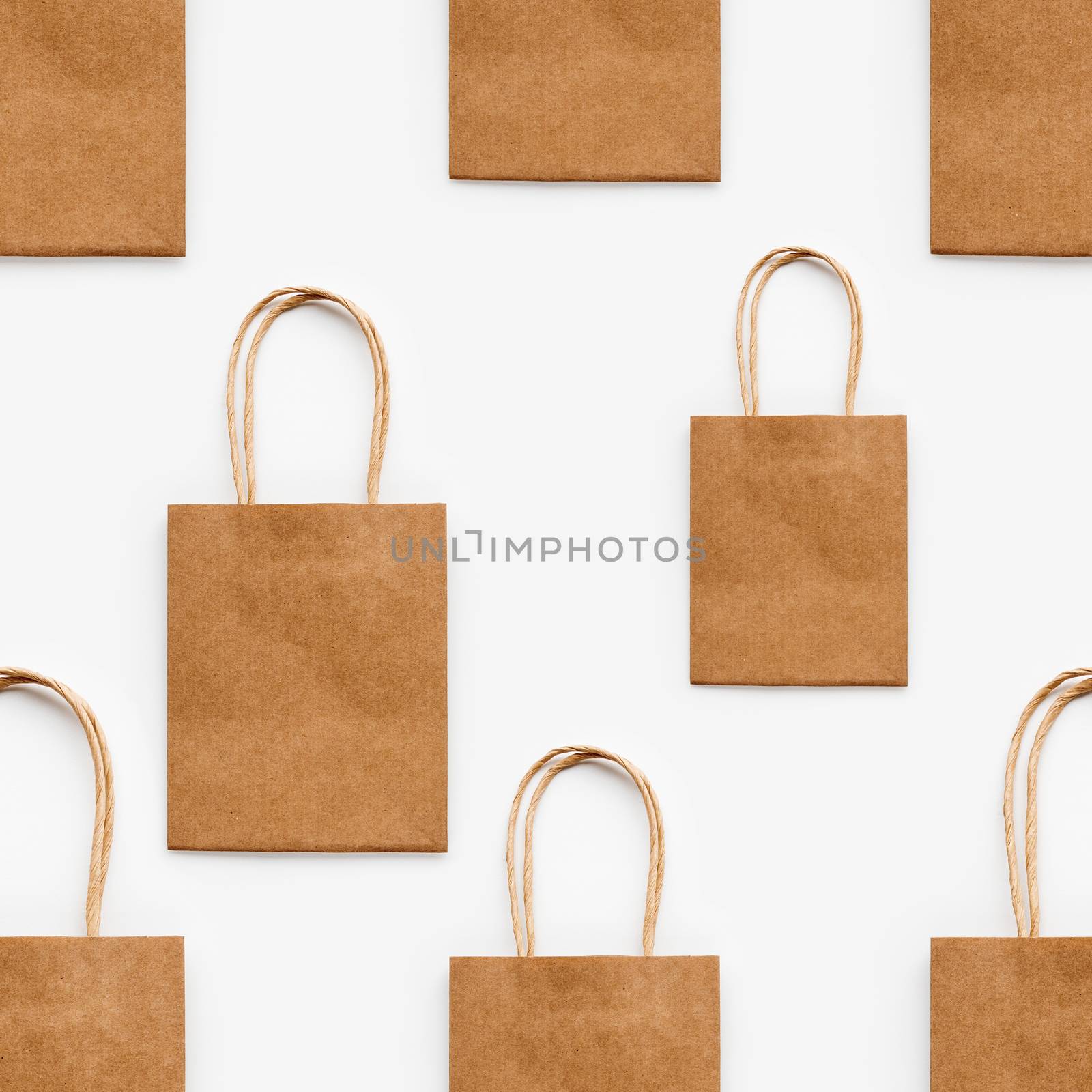 Photo seamless pattern with craft paper shopping bags. Zero waste lifestyle. Copy space. by aksenovko