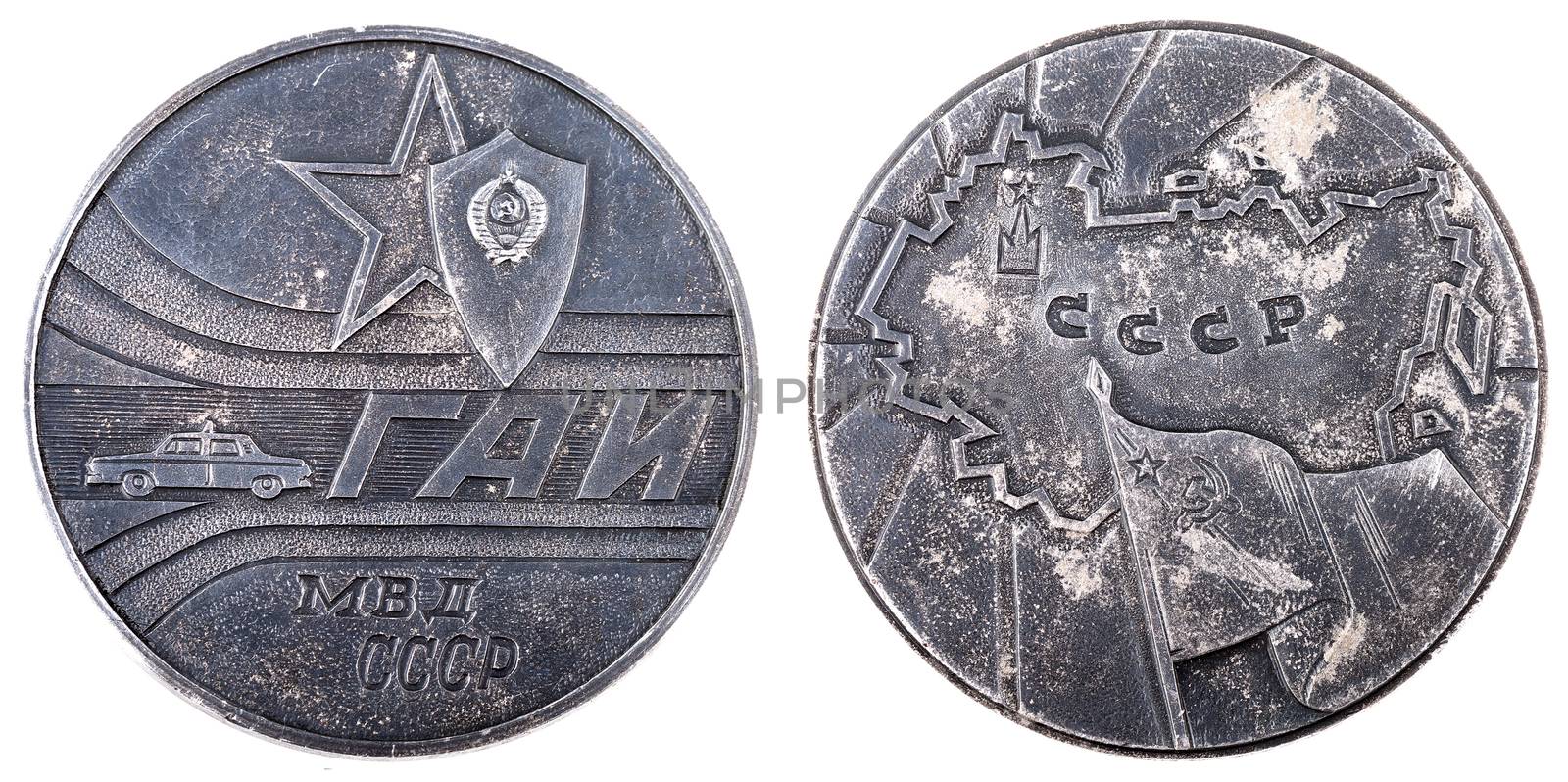Medal of GAI (traffic police) of the Soviet Union.Metal token with police car and words GAI, MVD (Ministry of internal affairs), USSR.