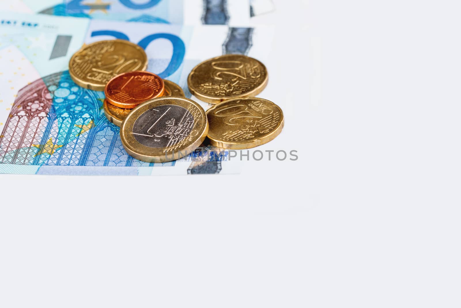 Euro coins and banknotes. European money, official currency of 19 of 28 member states of the European Union. Copy space.