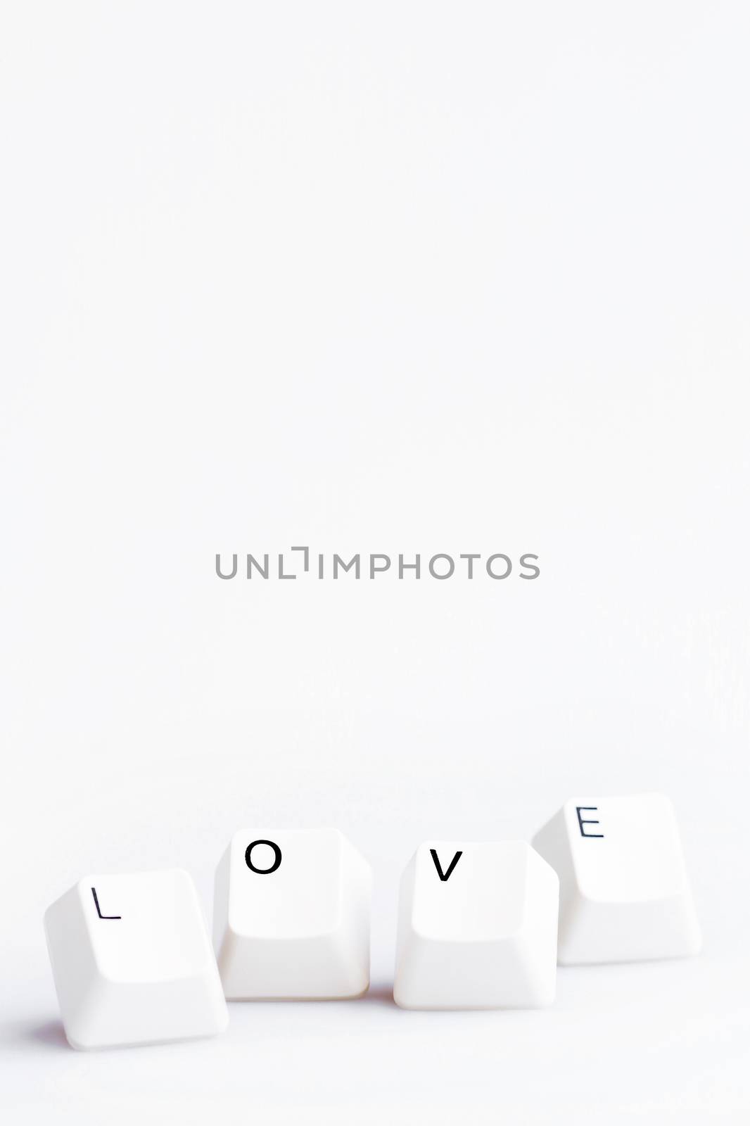 Word LOVE on computer keyboard's buttons. May be used as symbol of love on the Internet, love e-mail letters.