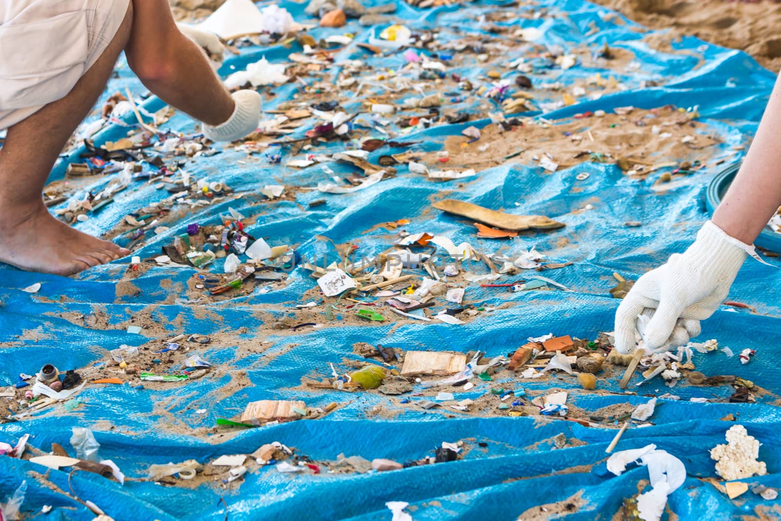 Beach Cleaning. Cleaning dirty beaches by the action of man. Sustainability of the planet and preservation of nature.