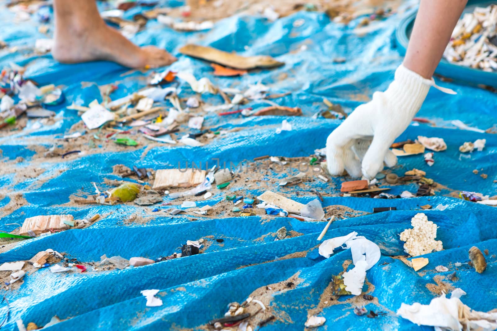 Beach Cleaning. Cleaning dirty beaches by the action of man. Sustainability of the planet and preservation of nature.