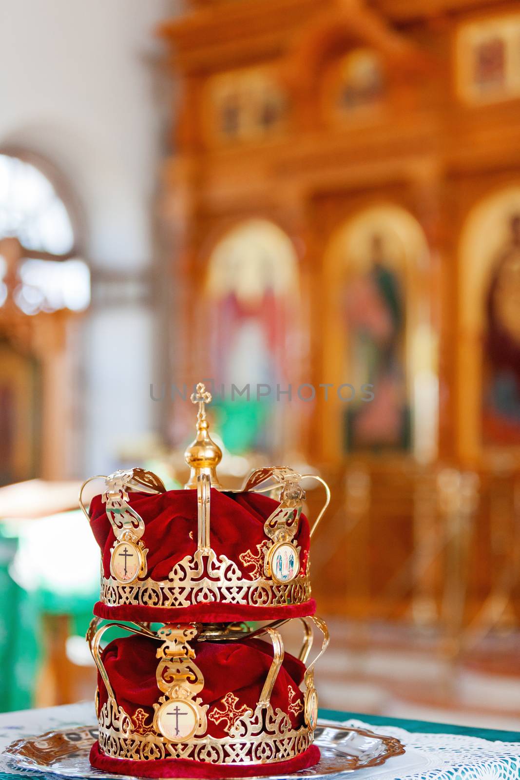 Bridal crowns. Sacral details of wedding ceremony in the Orthodox Christian Church. Russia.