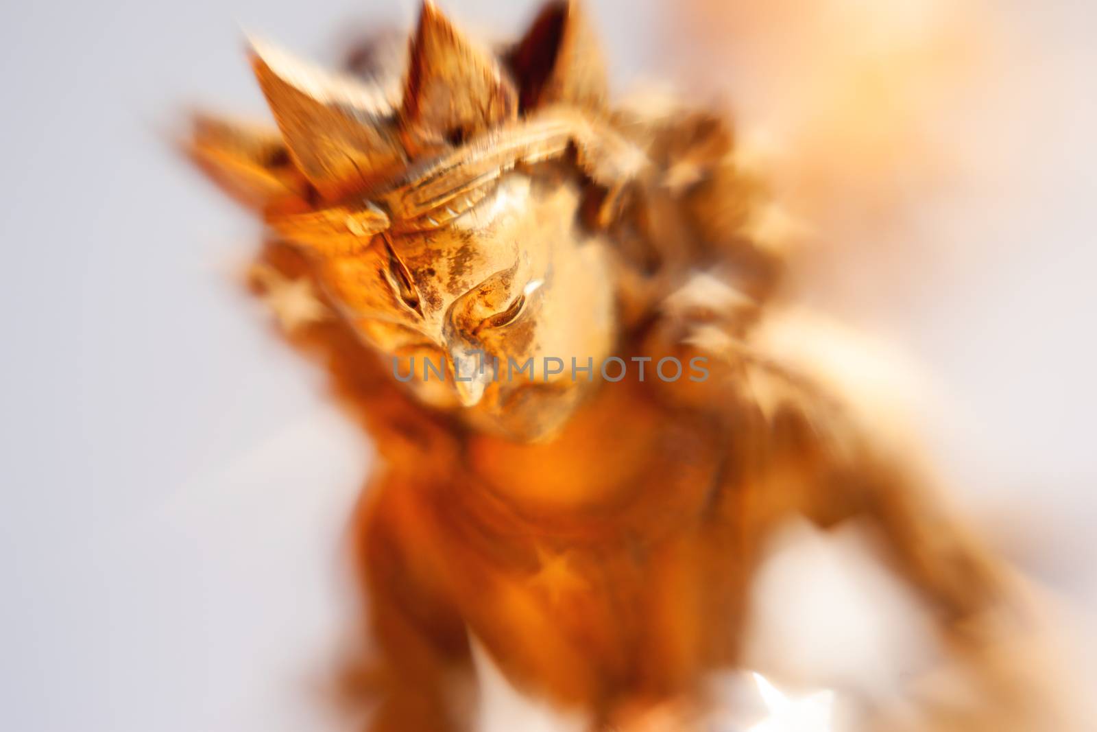 Close up photo of unknown goddess statue. Old rusty metal sculpture captured with Lens Baby Sweet 35mm.