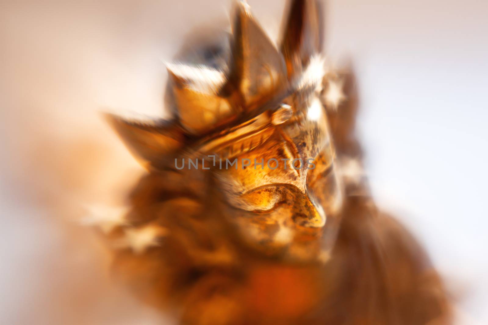 Close up photo of unknown goddess statue. Old rusty metal sculpture captured with Lens Baby Sweet 35mm.