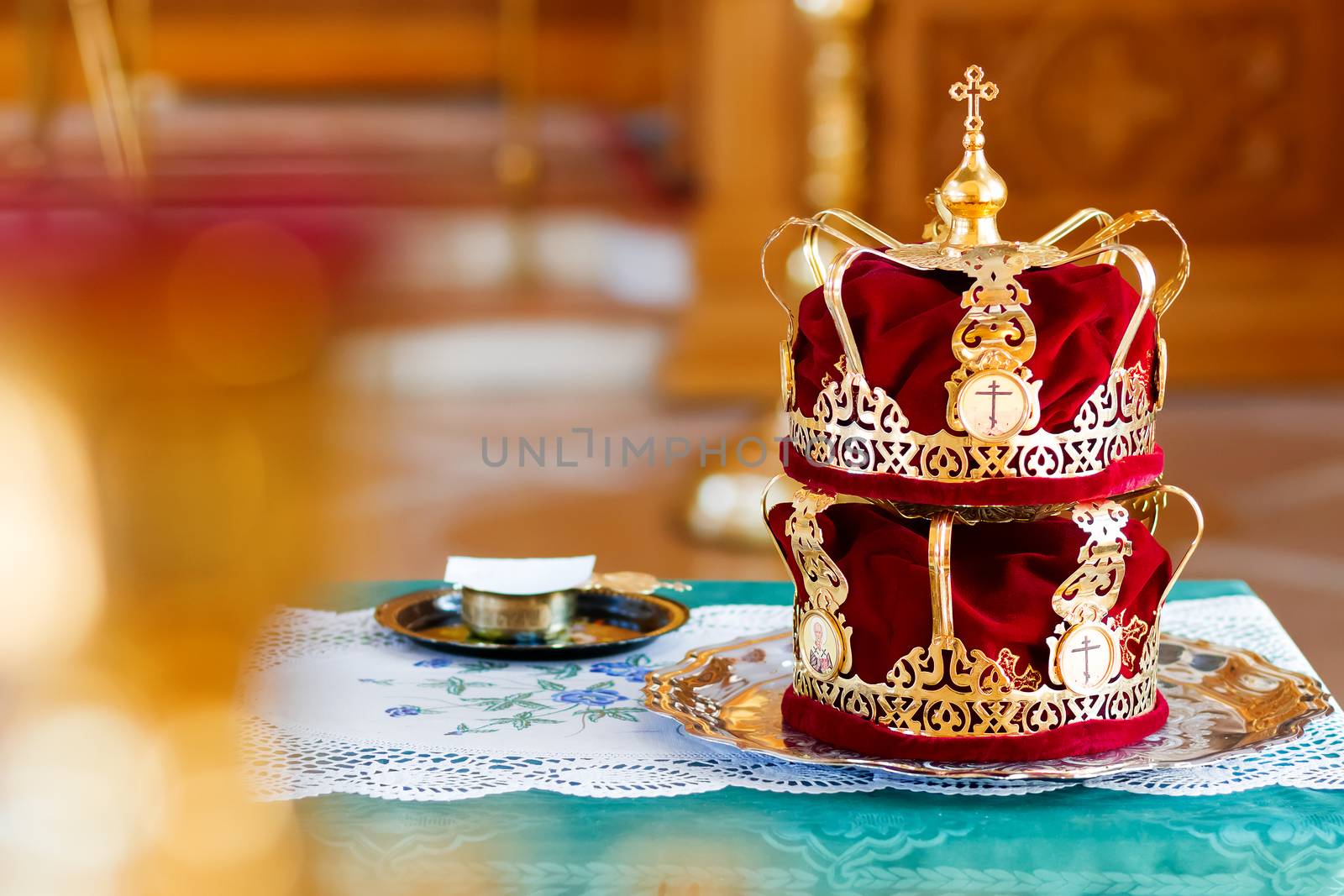 Bridal crowns. Sacral details of wedding ceremony in the Orthodox Christian Church. Russia.