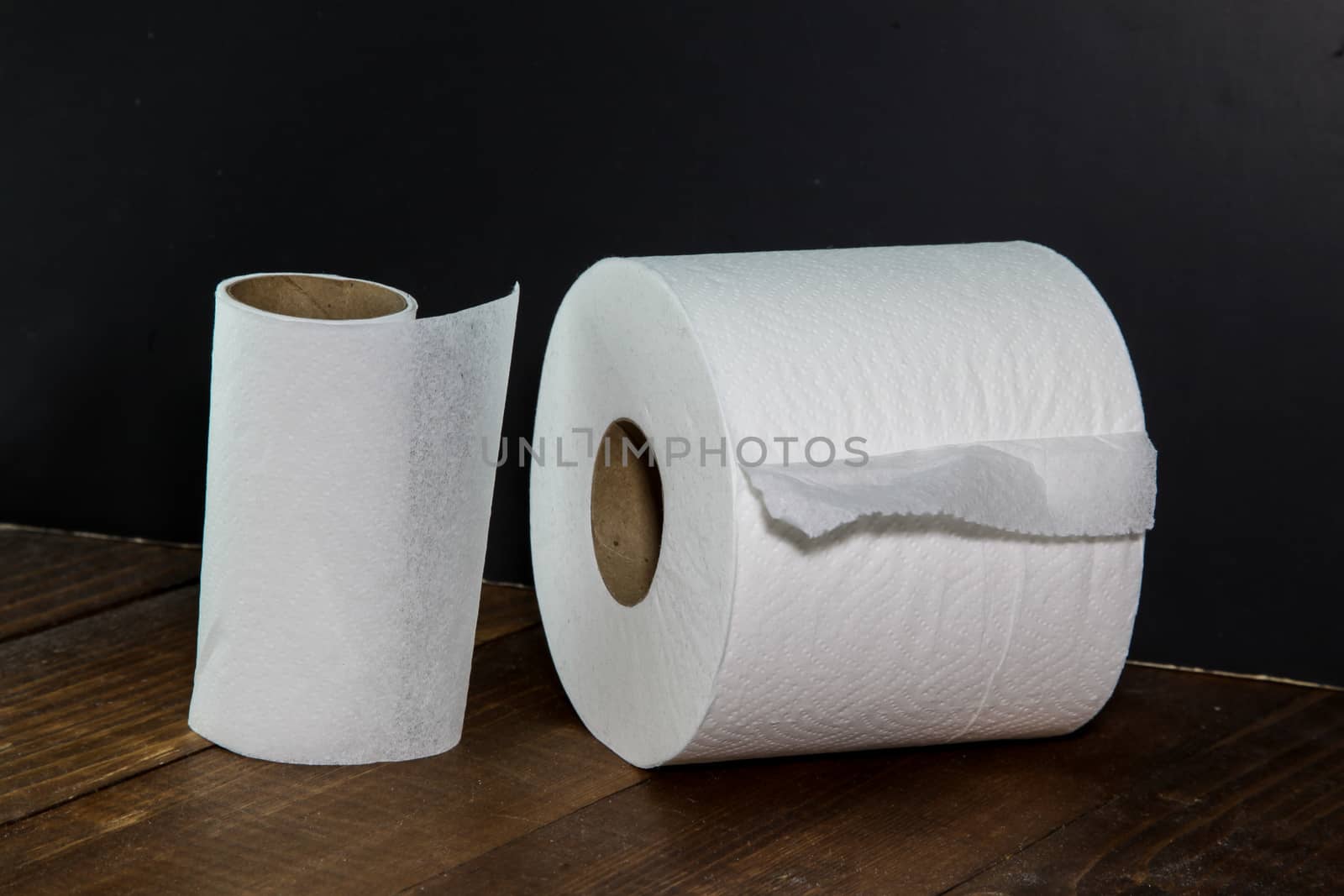 Two roll toilet paper with black background