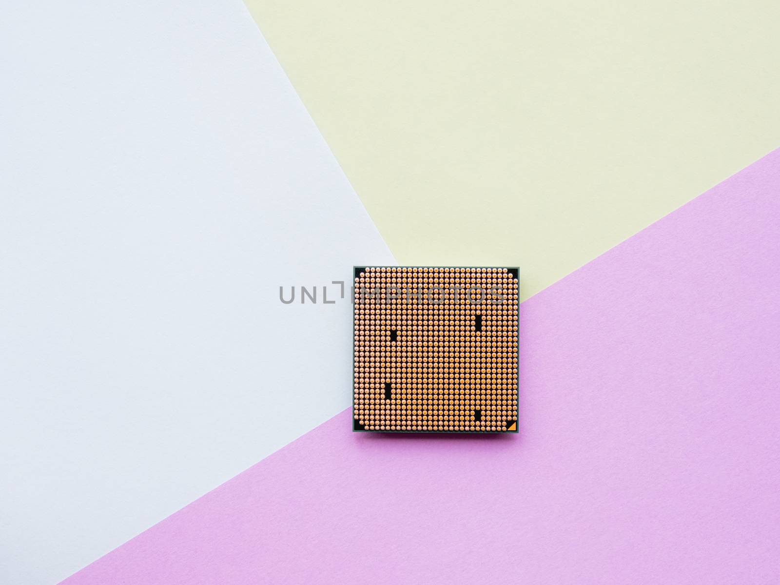 Central Computer Processor. CPU on geometric background. Colorful copy space. Technological detail of personal computer.