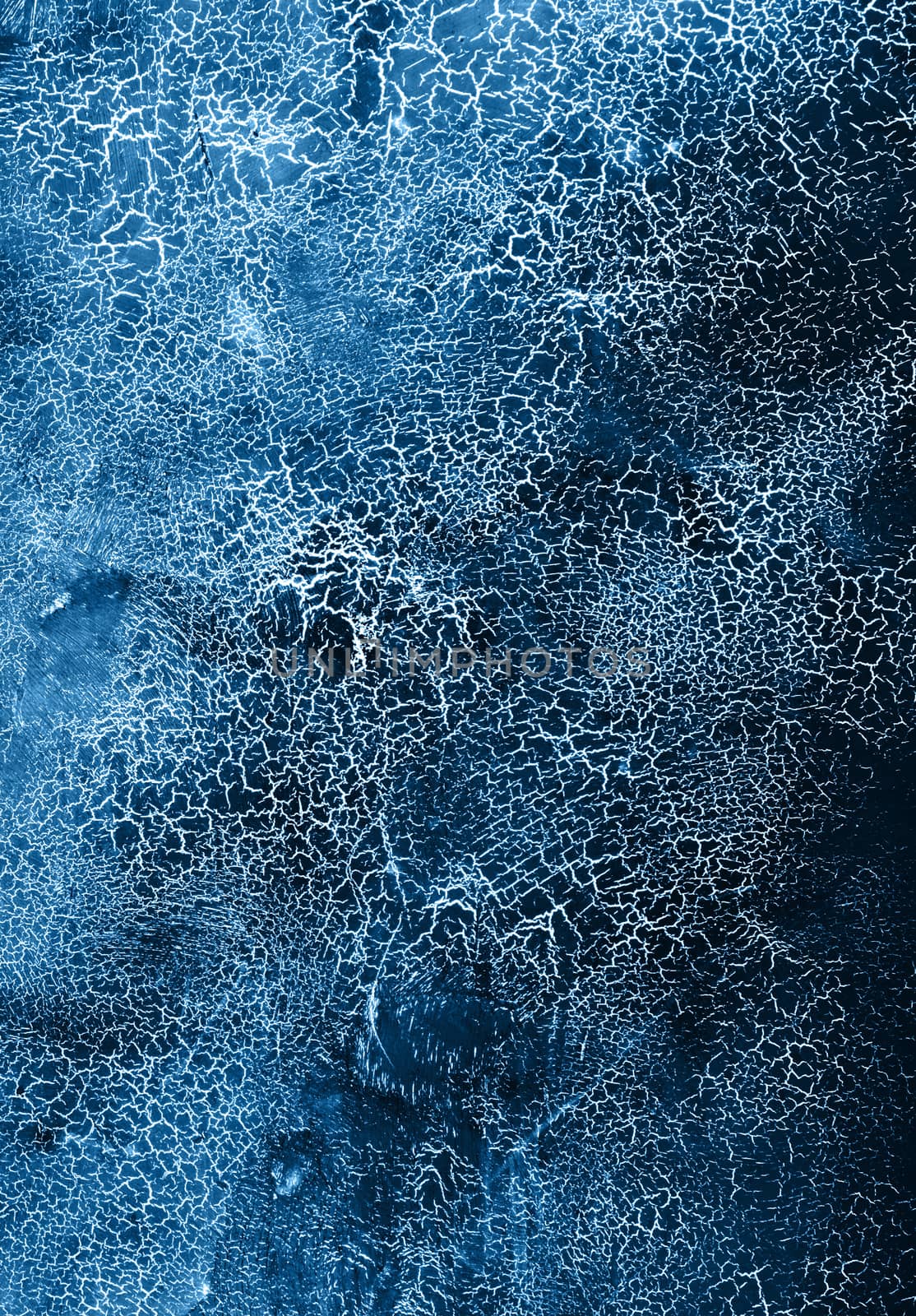 Classic blue colored texture with cracks. Surface with craquelure effect.