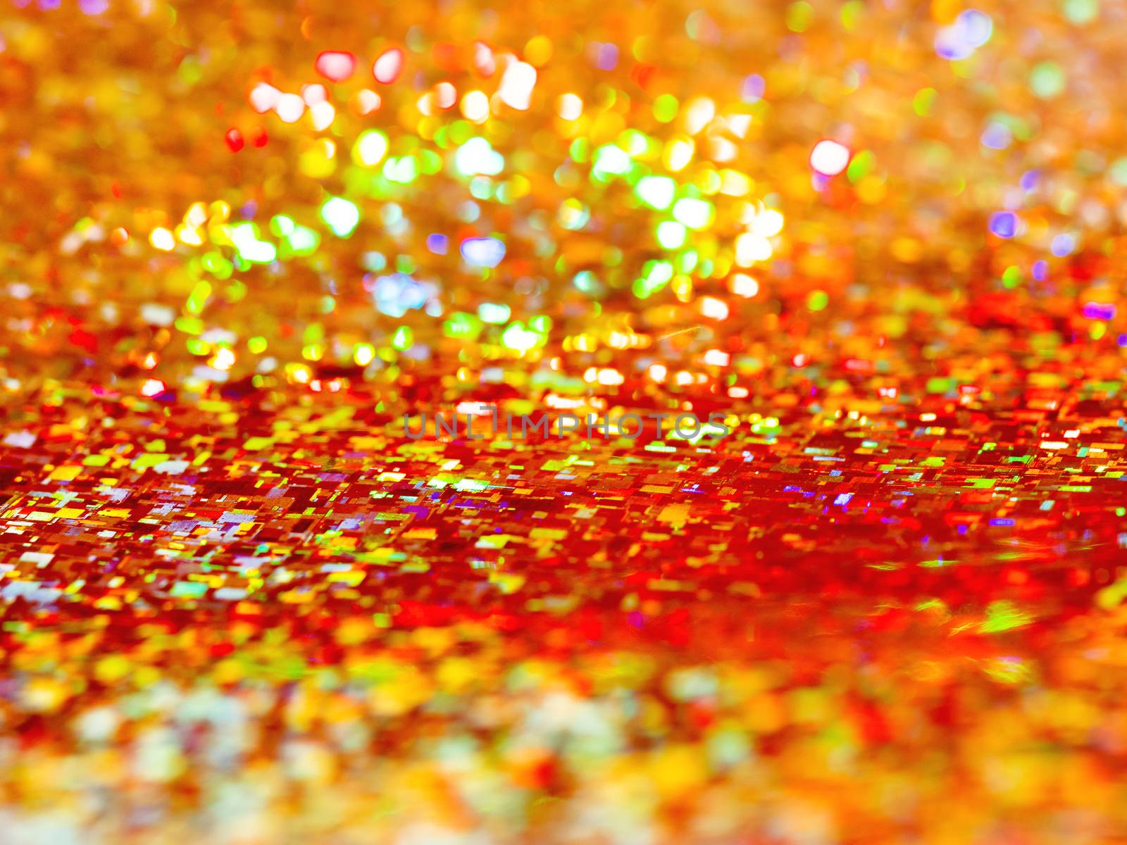 Bright red background. Shiny and sparkling holographic rainbow backdrop.