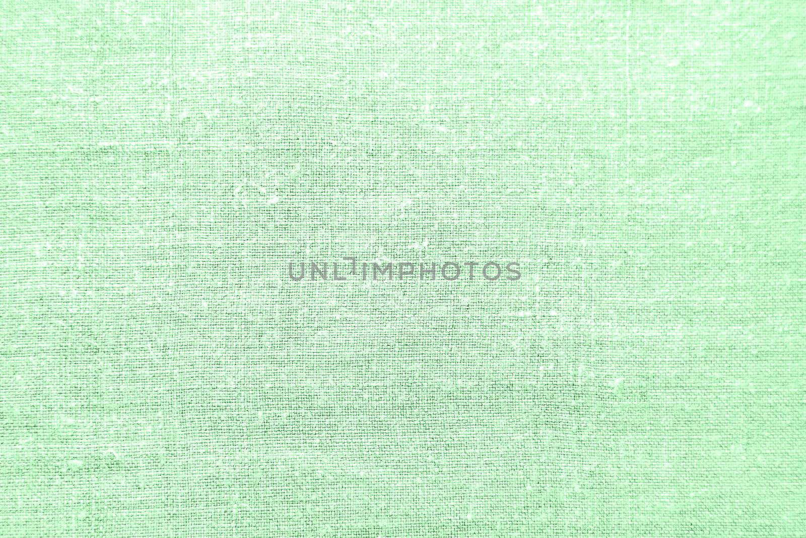Homespun linen fabric in color of neo mint. Abstract textile background.