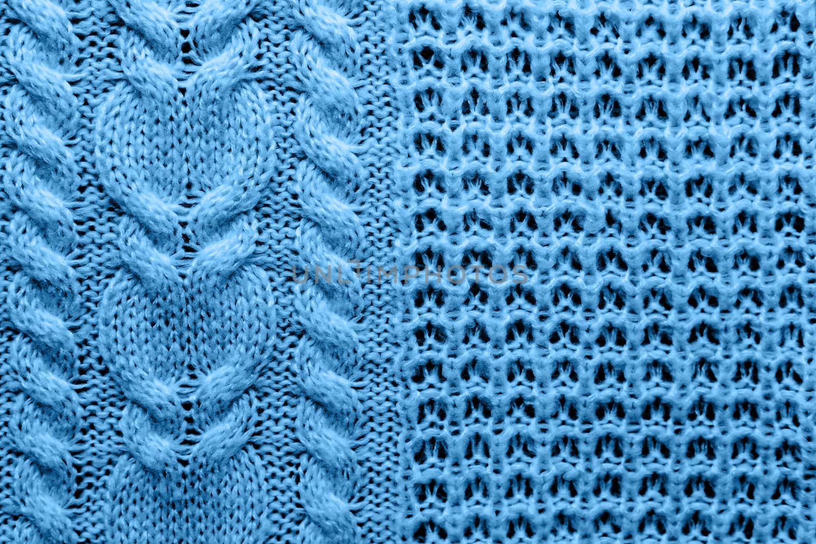 Abstract knitted background. Blue woolen sweater texture. Close up picture of knitted pattern.
