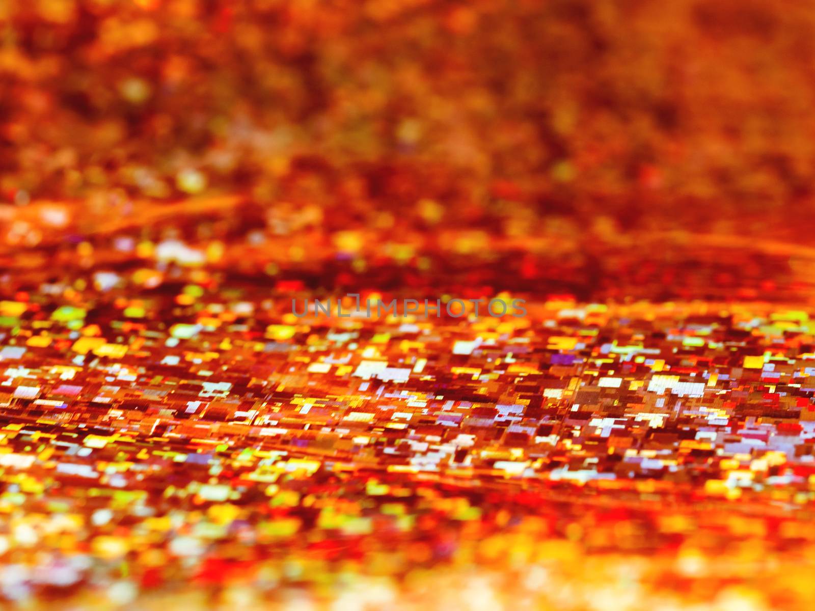 Bright red background. Shiny and sparkling holographic rainbow backdrop.
