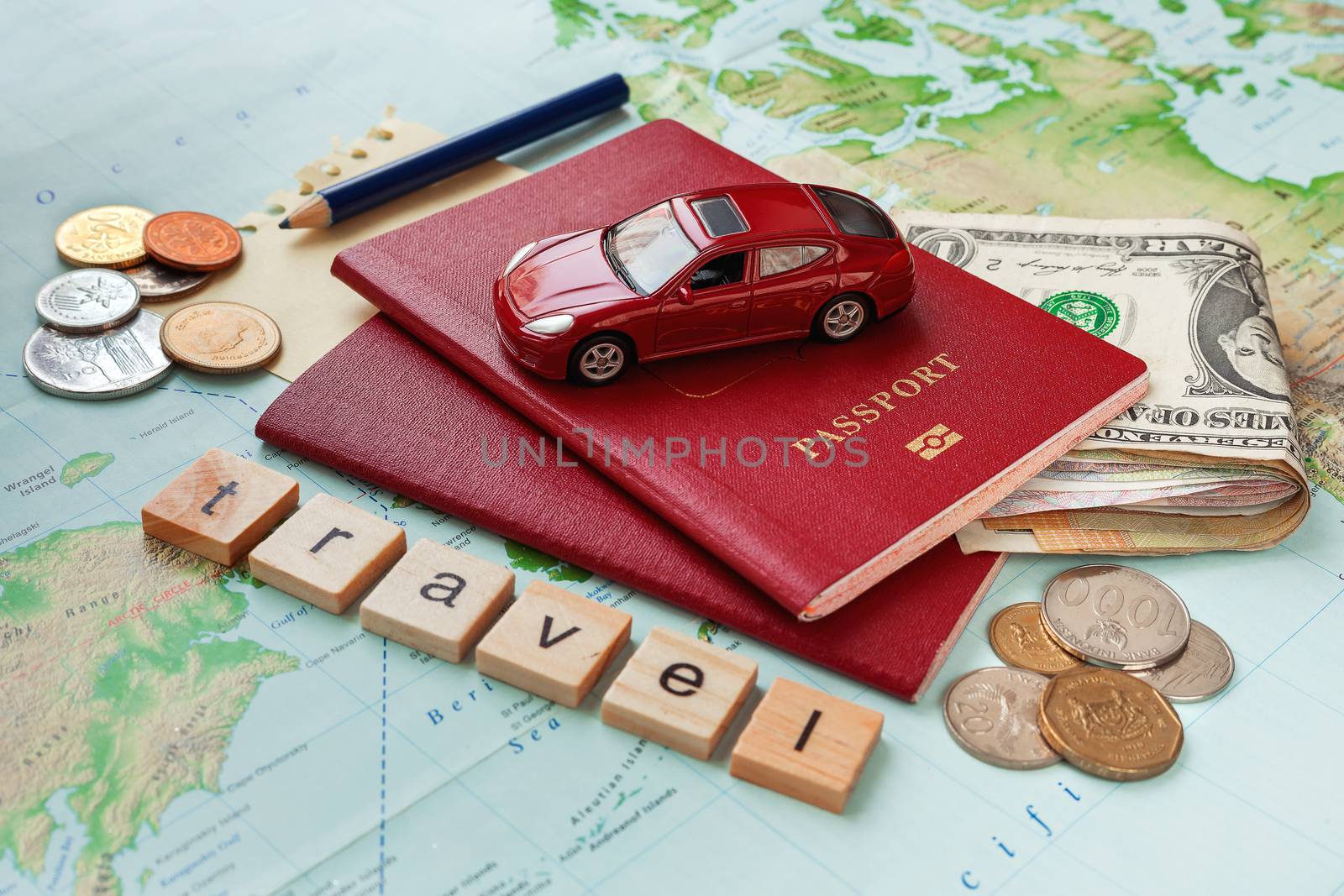 Travel background with passport, money, map and notes. Word TRAVEL and symbol of car travel - car model.