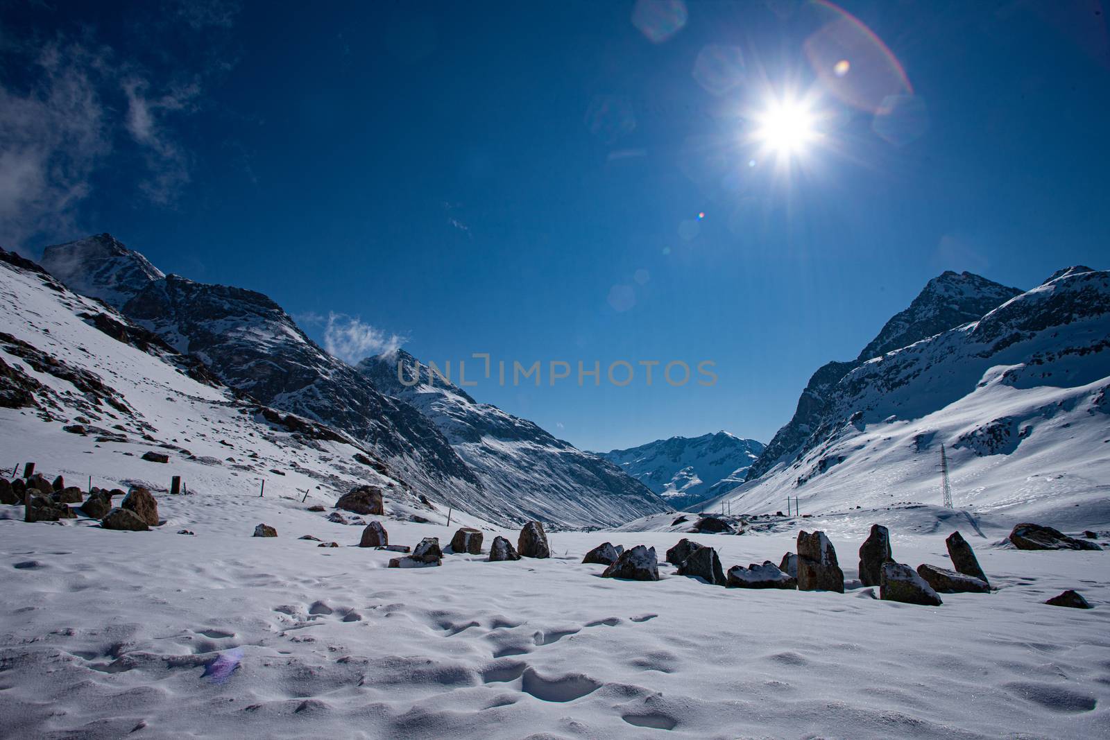 Alpine pass in switzerland, Julierpass in swiss alp with snow by PeterHofstetter