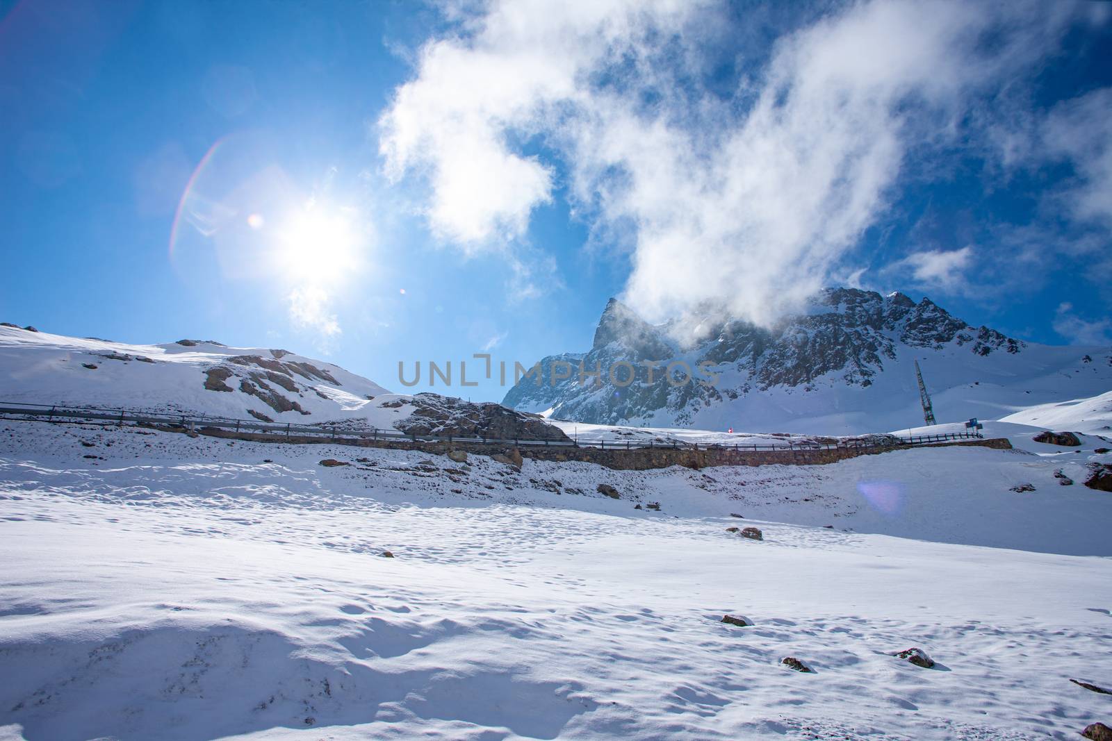 Alpine pass in switzerland, Julierpass in swiss alp with snow by PeterHofstetter