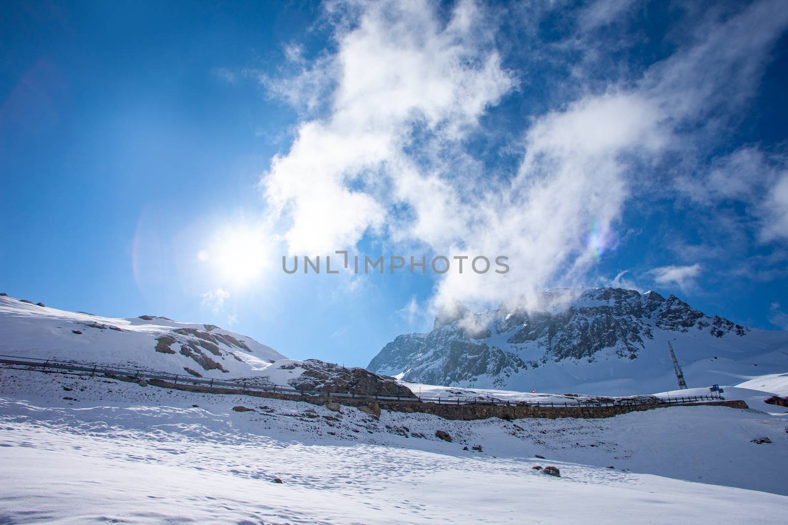 Alpine pass in switzerland, Julierpass in swiss alp with snow by PeterHofstetter