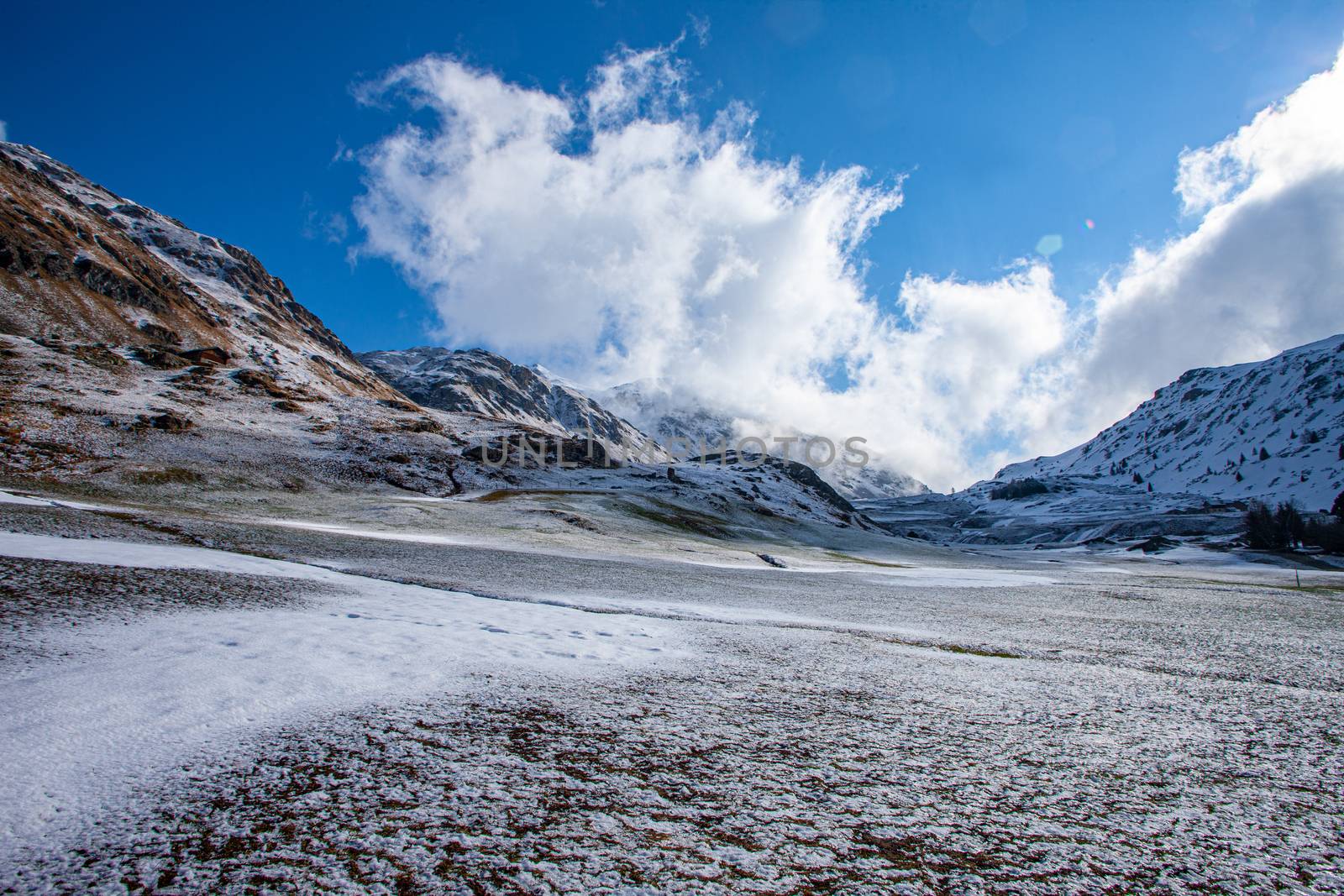 Alpine pass in switzerland, Julierpass in swiss alp with snow by PeterHofstetter
