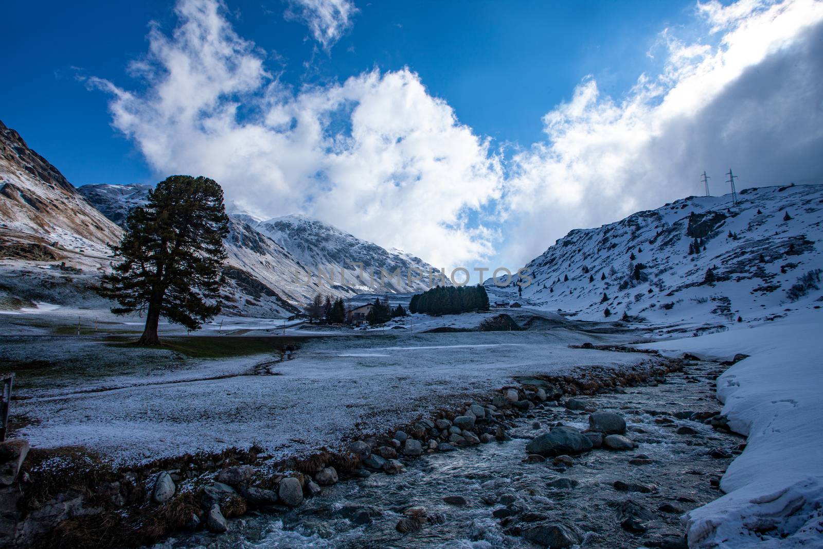 Alpine pass in switzerland, Julierpass in swiss alp with snow by PeterHofstetter