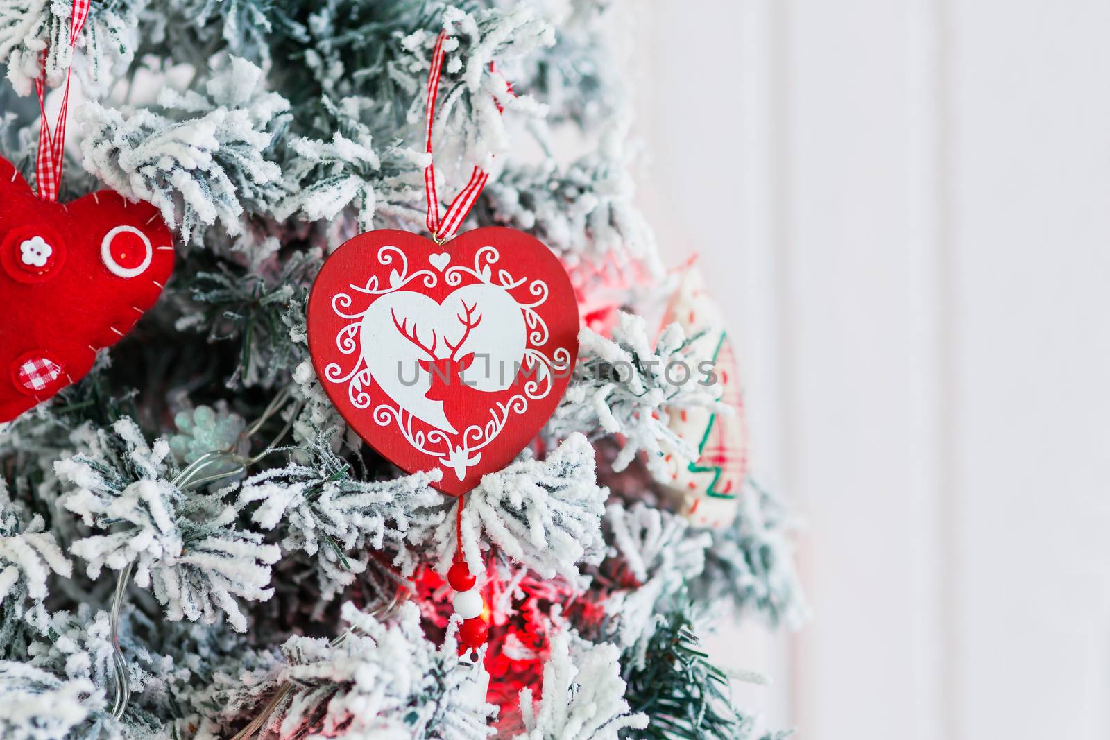 Christmas and New Year background with Eve Tree and decorations. Cozy holiday morning at home.