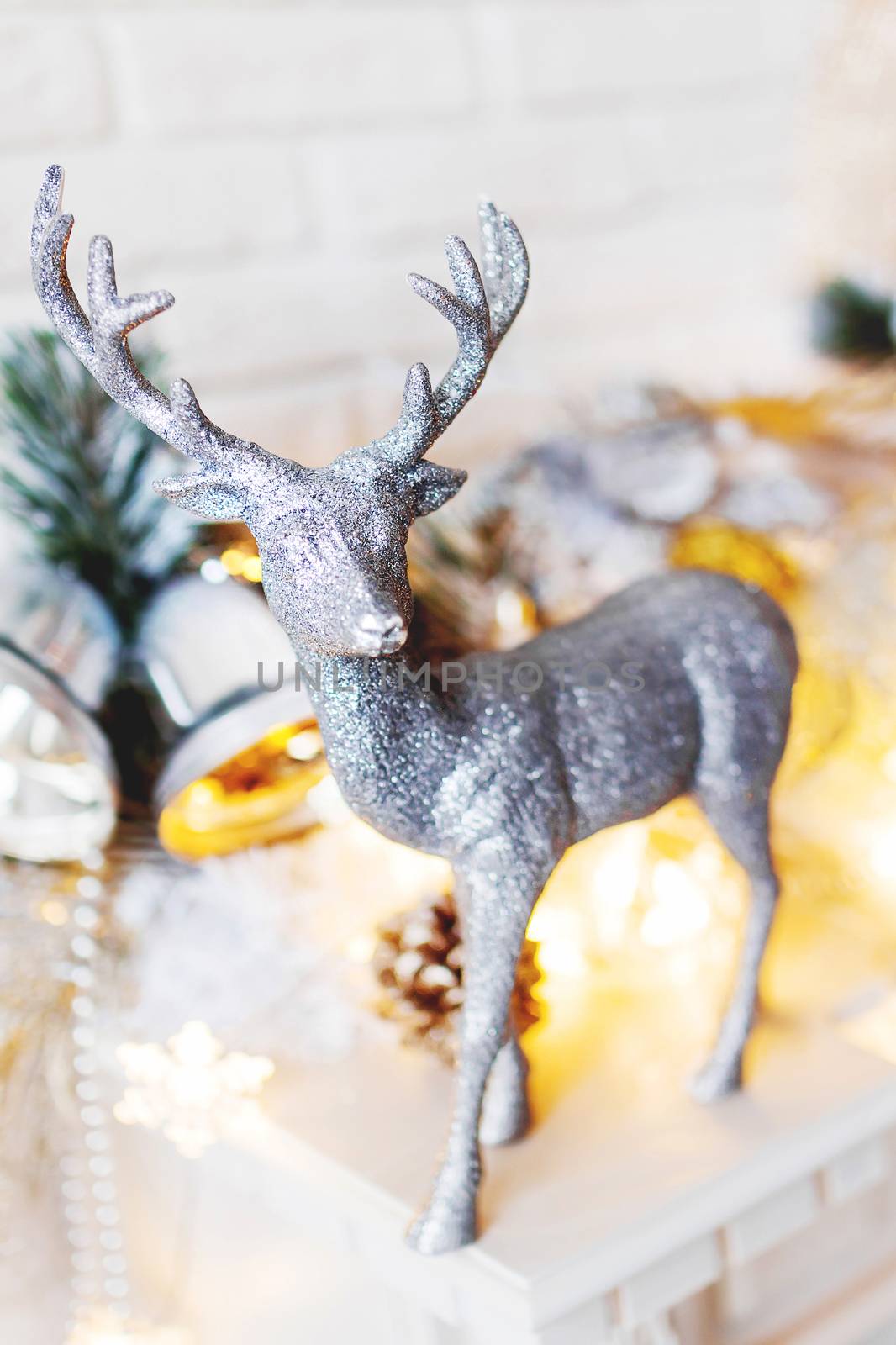 Christmas and New Year decorations with silver deer. Holiday winter background.