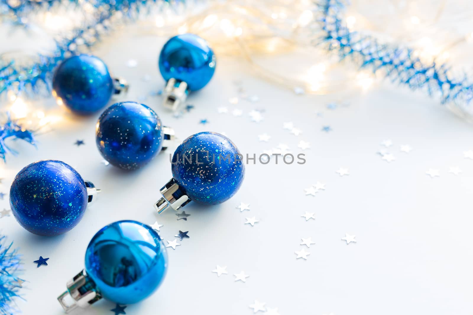 Christmas and New Year background with blue decorative balls for Christmas tree. Place for text.