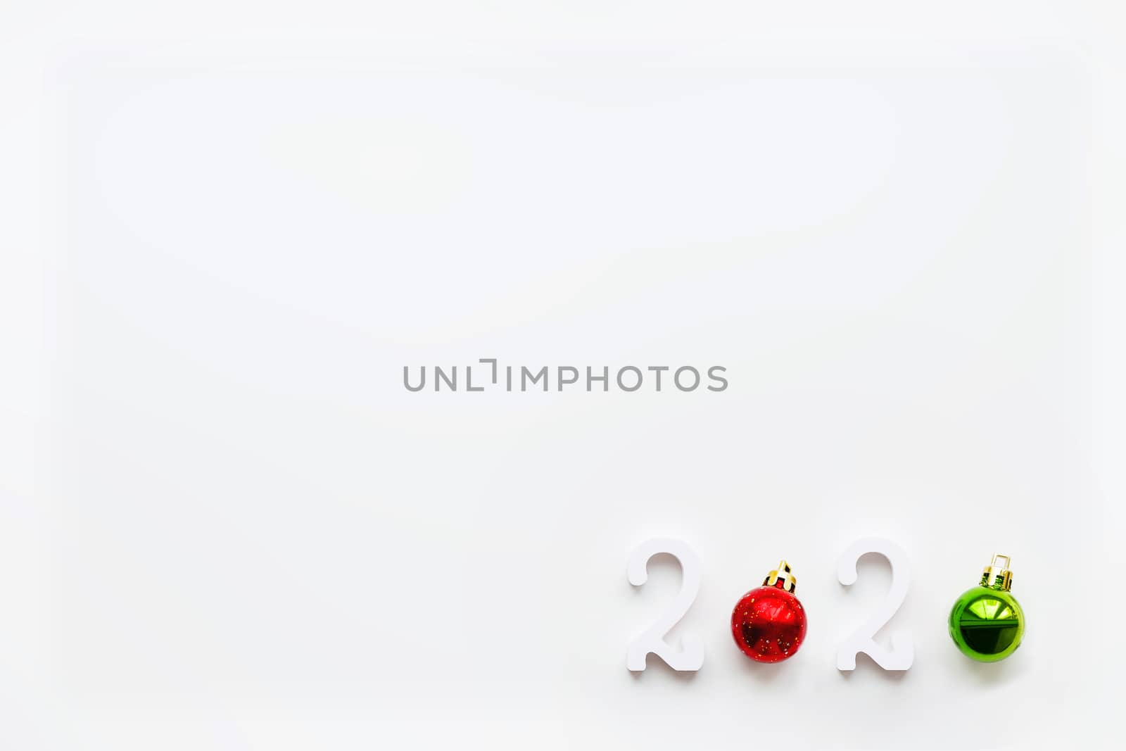 New Year 2020 background with bright red ball. White copy space.