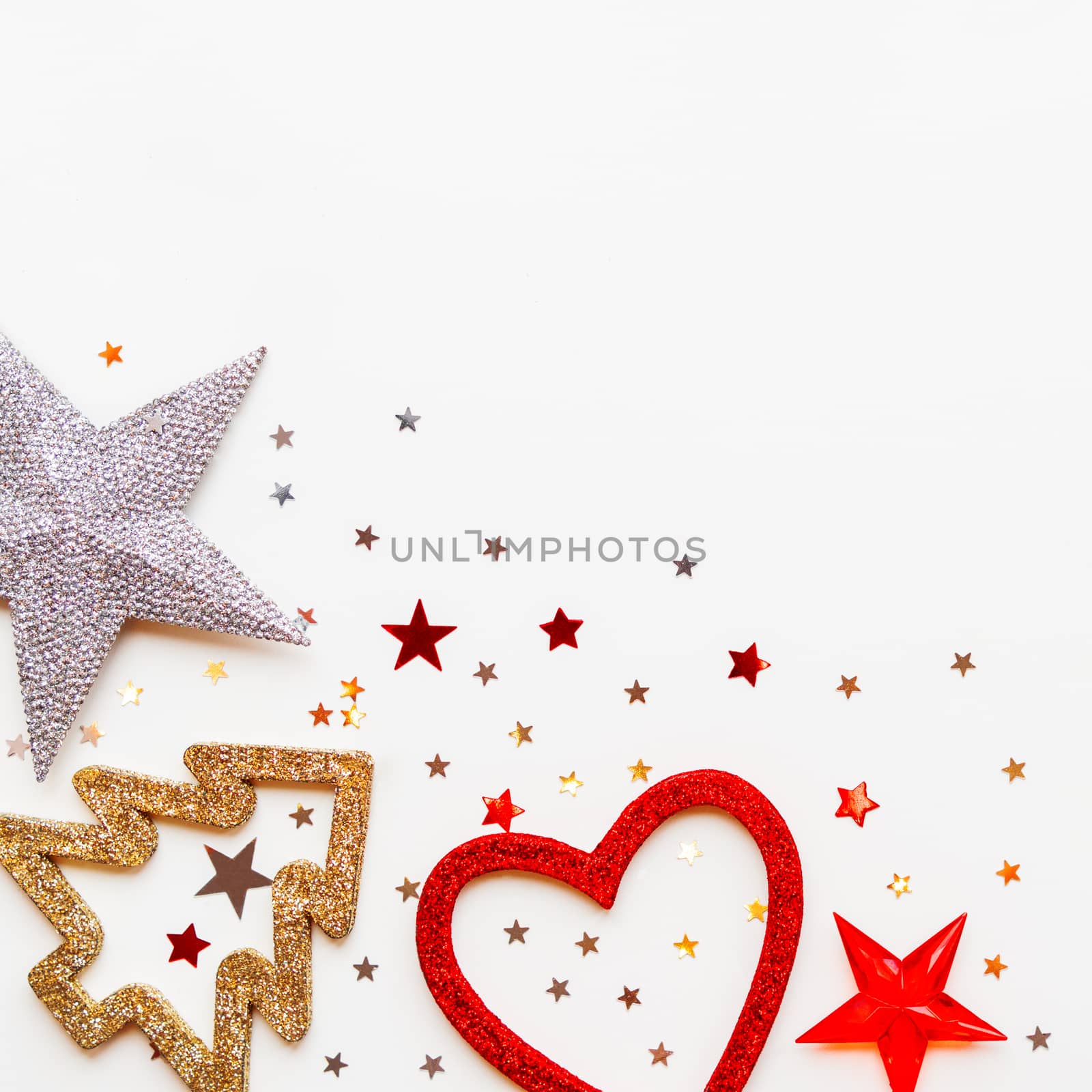 Christmas and New Year background with decorations - shiny stars, balls, snowflakes, heart, confetti.