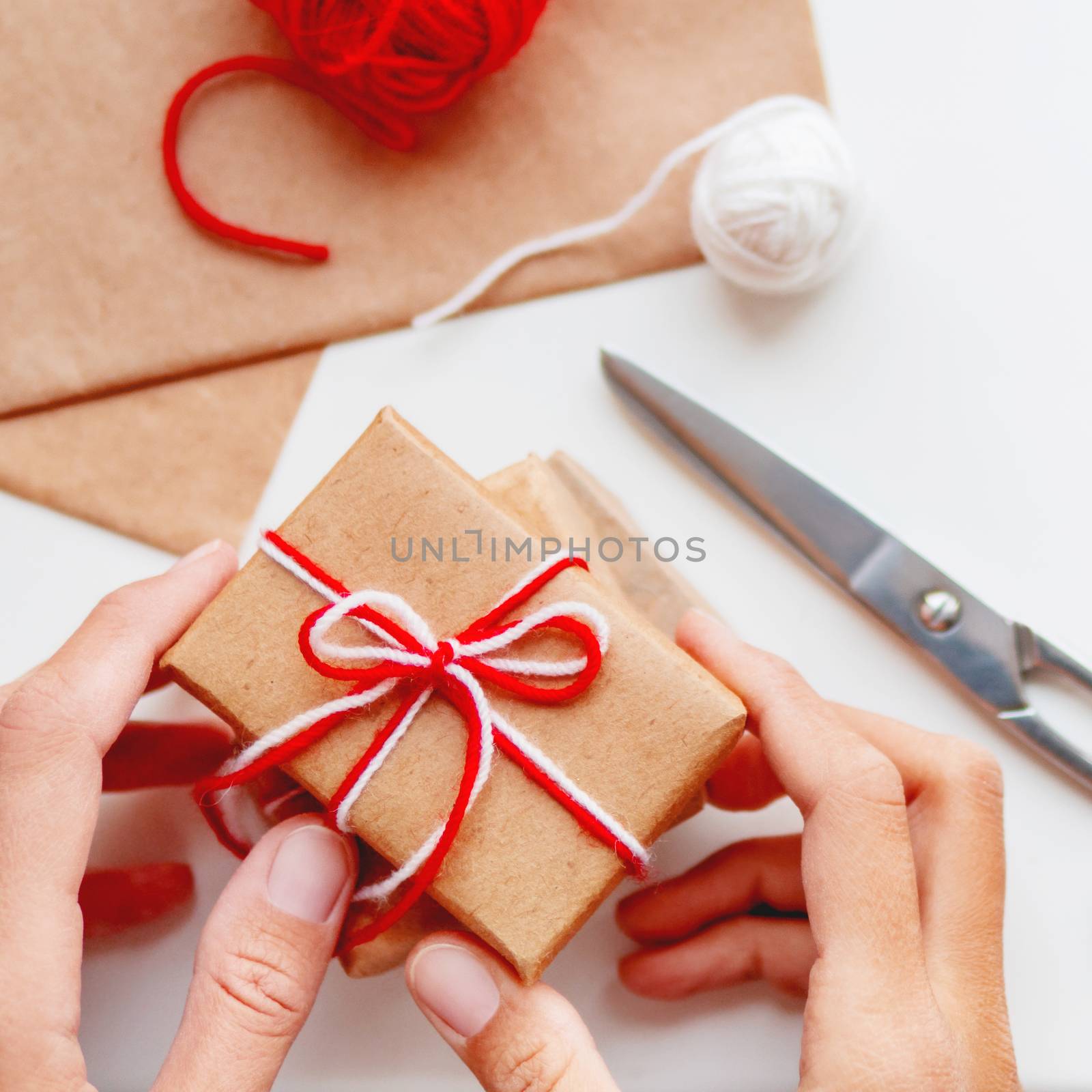DIY presents wrapped in craft paper. Gifts packed and tied with by aksenovko