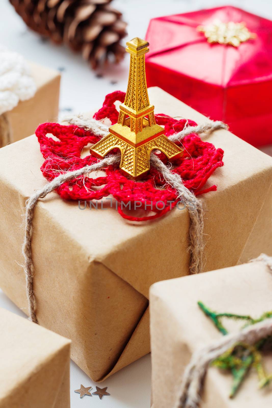 Christmas and New Year background with presents and decorations. Symbol of Paris and France - Eiffel tower.