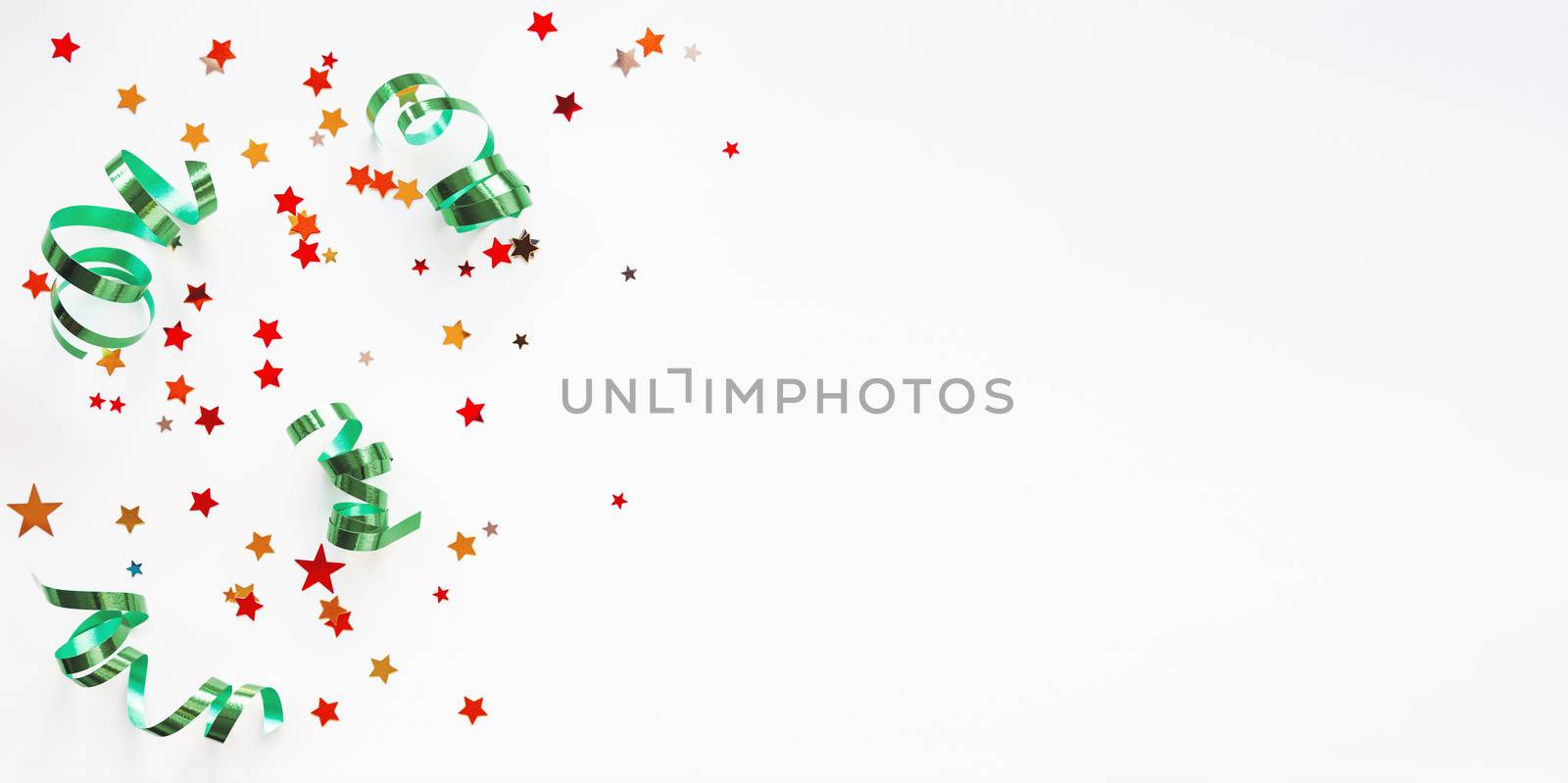 Holiday background with colorful red stars confetti and green cu by aksenovko