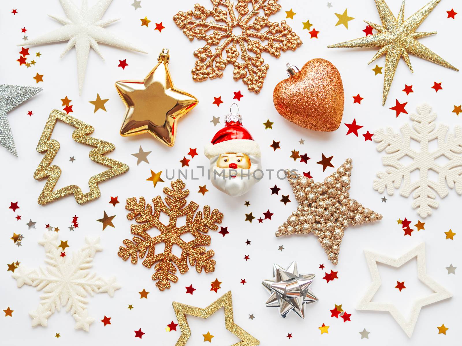 Christmas and New Year background with sparkling fir tree, Santa Claus, heart, snowflakes and star confetti. Holiday decorations on white background.