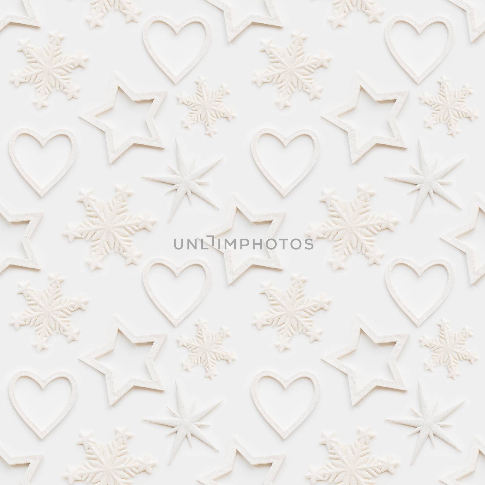Seamless pattern with decorative stars, snowflakes, hearts. Christmas decorations on white background. New Year concept, photo pattern.