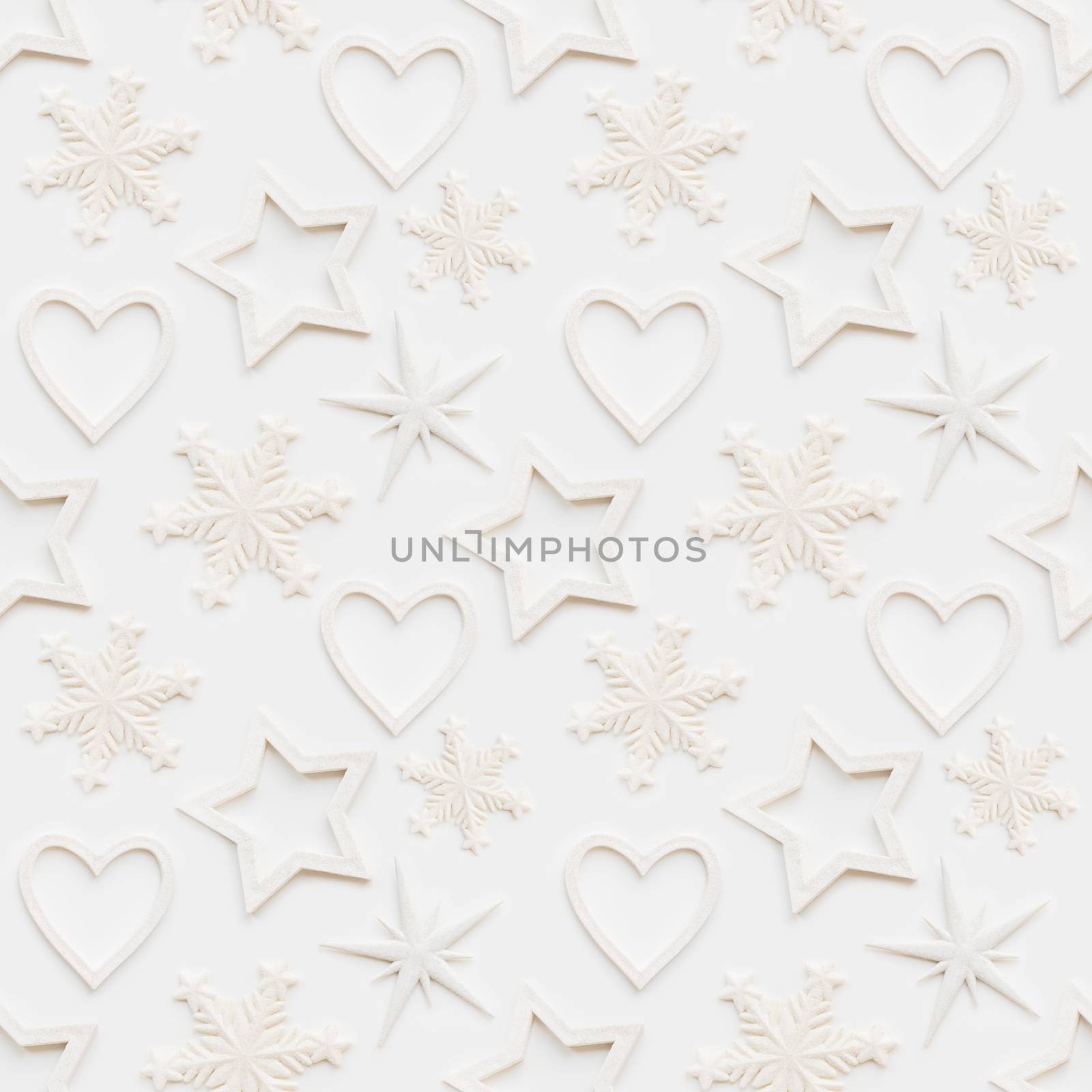 Seamless pattern with decorative stars, snowflakes, hearts. Christmas decorations on white background. New Year concept, photo pattern.