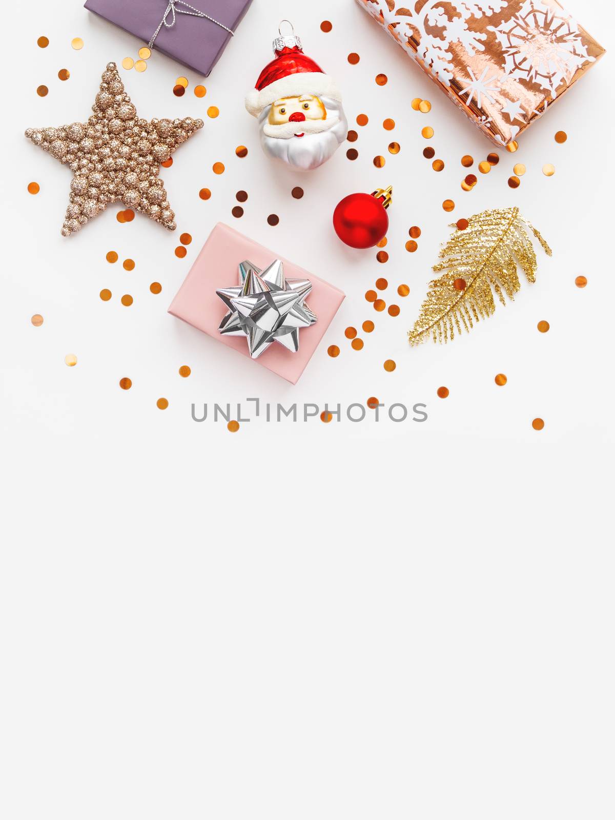 Christmas and New Year 2020 background with decorations. Santa Claus, golden feathers, presents and stars confetti.