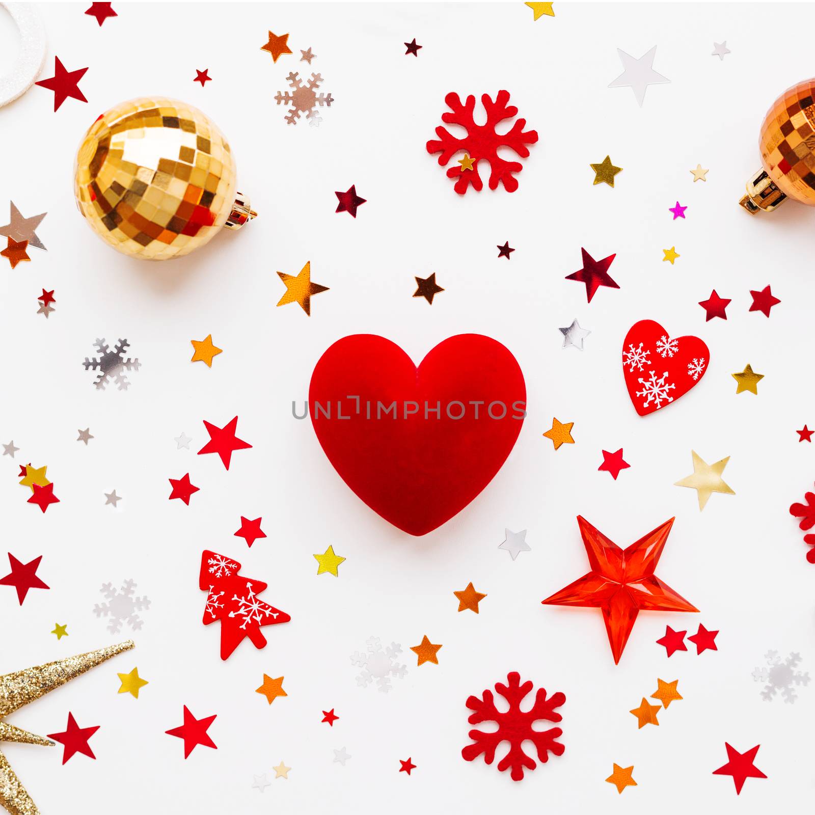 Christmas and New Year holiday background with decorations and red gift heart box. Top view, flat lay.